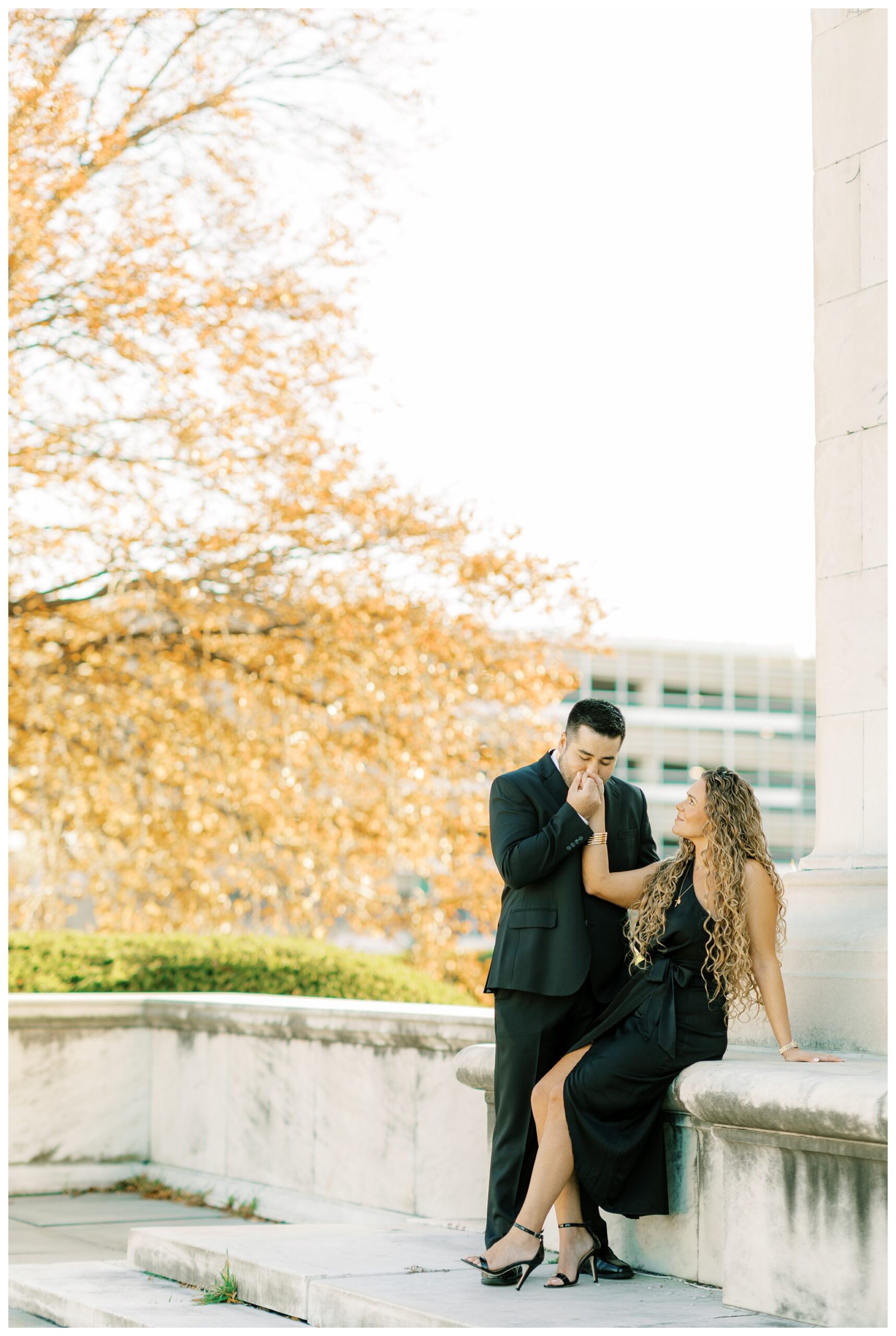 luxury engagement shoot with black dress near detroit institute of arts in downtown by josh and andrea photography 