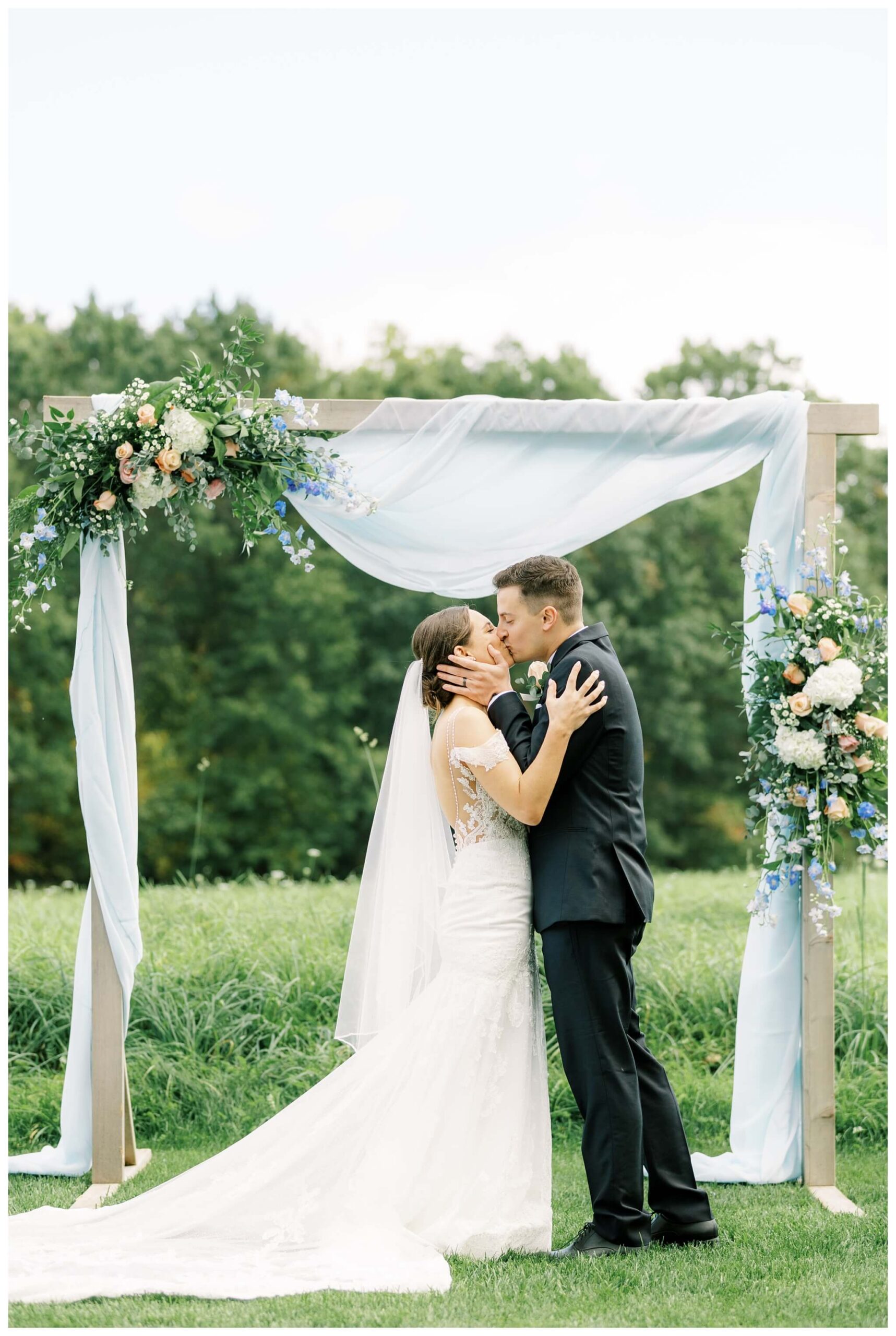 blue whimsical garden party wedding at cushing field house near holly michigan by josh and andrea photography