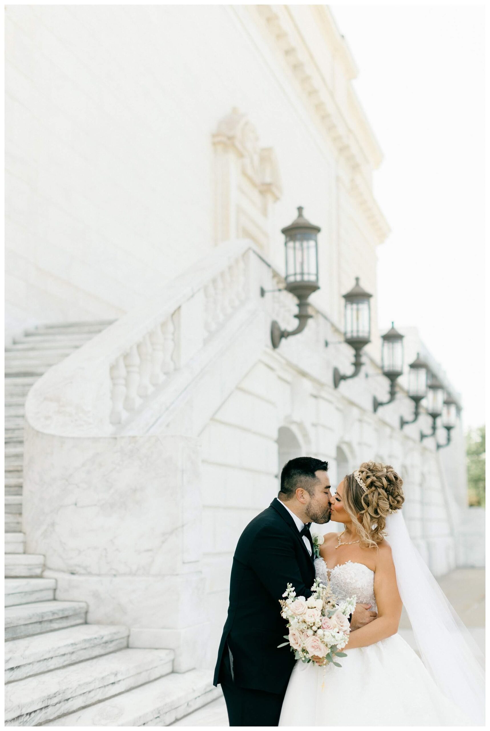 timeless ballroom wedding in downtown detroit at the colony club with motor city vintage rentals and josh and andrea photography