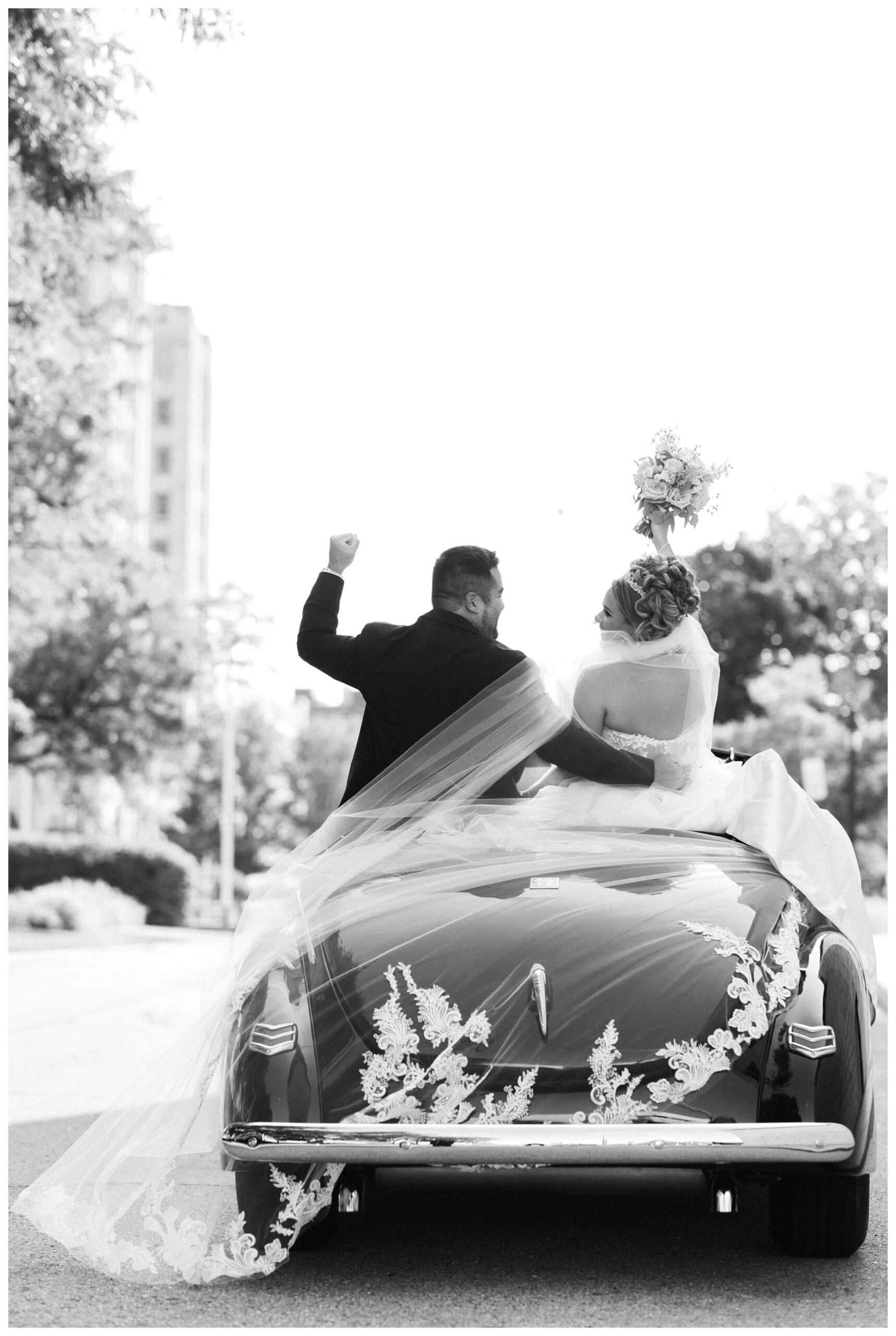 timeless ballroom wedding in downtown detroit at the colony club with motor city vintage rentals and josh and andrea photography