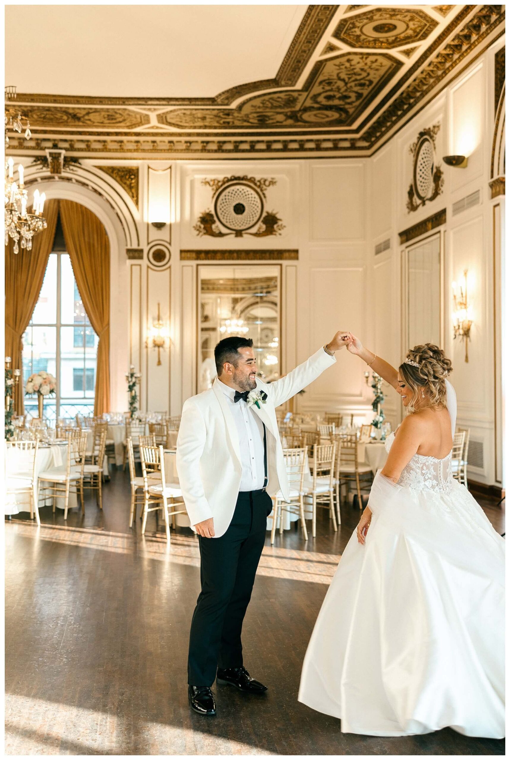 timeless ballroom wedding in downtown detroit at the colony club with motor city vintage rentals and josh and andrea photography