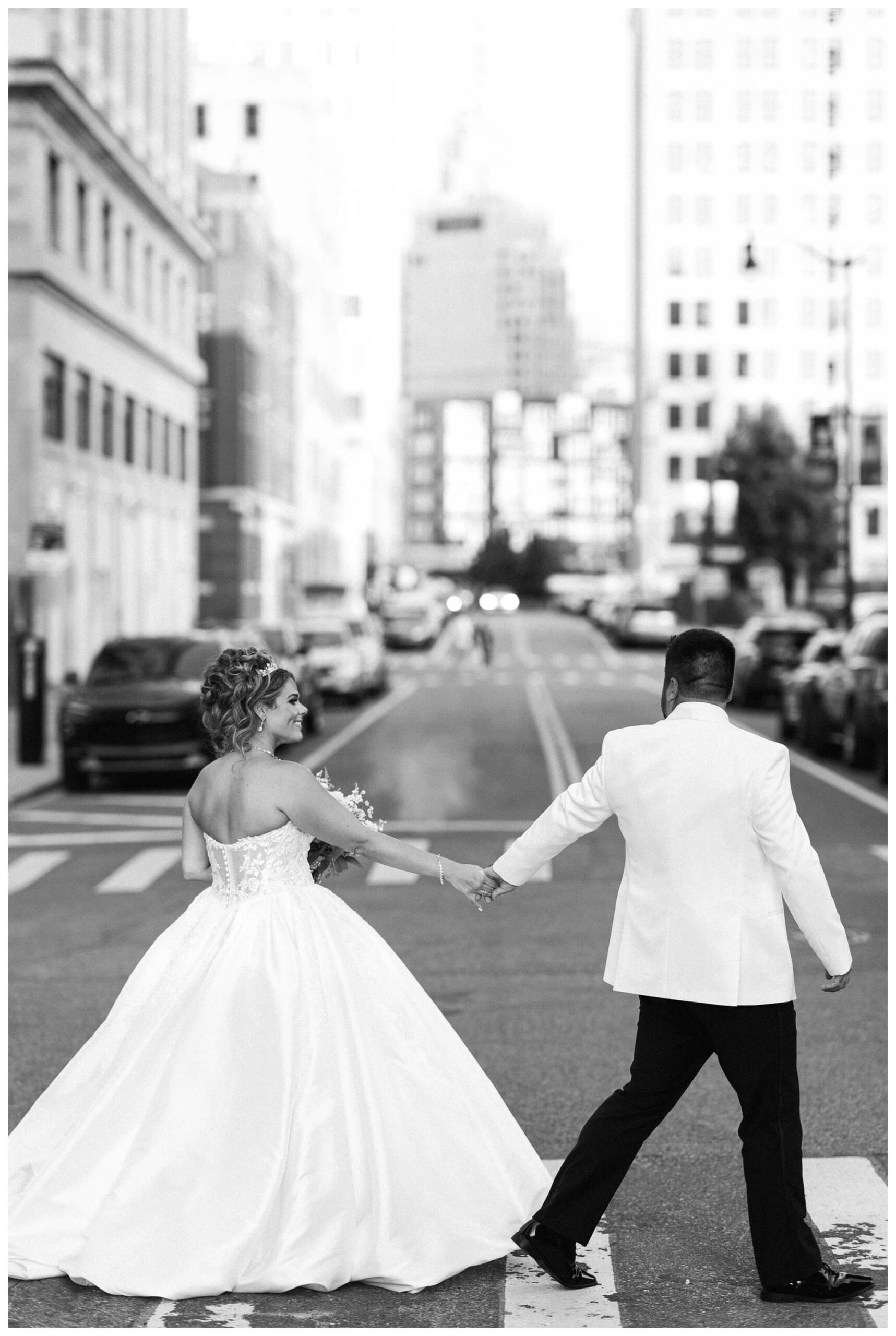 timeless ballroom wedding in downtown detroit at the colony club with motor city vintage rentals and josh and andrea photography