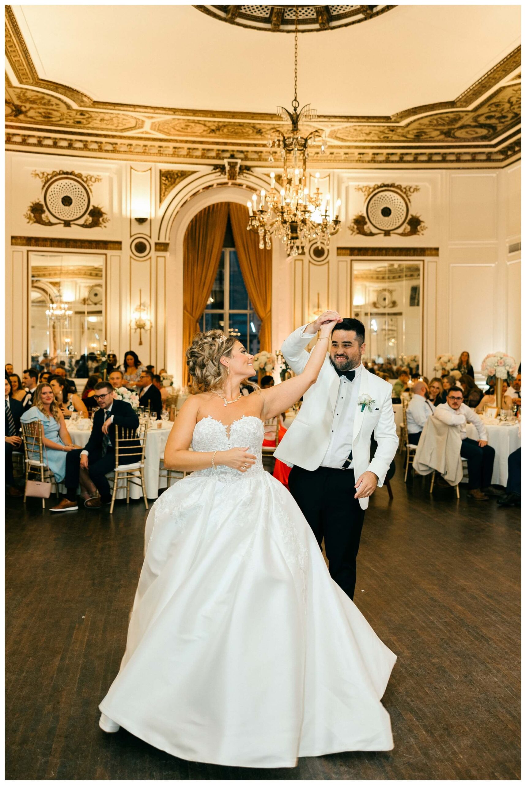 timeless ballroom wedding in downtown detroit at the colony club with motor city vintage rentals and josh and andrea photography