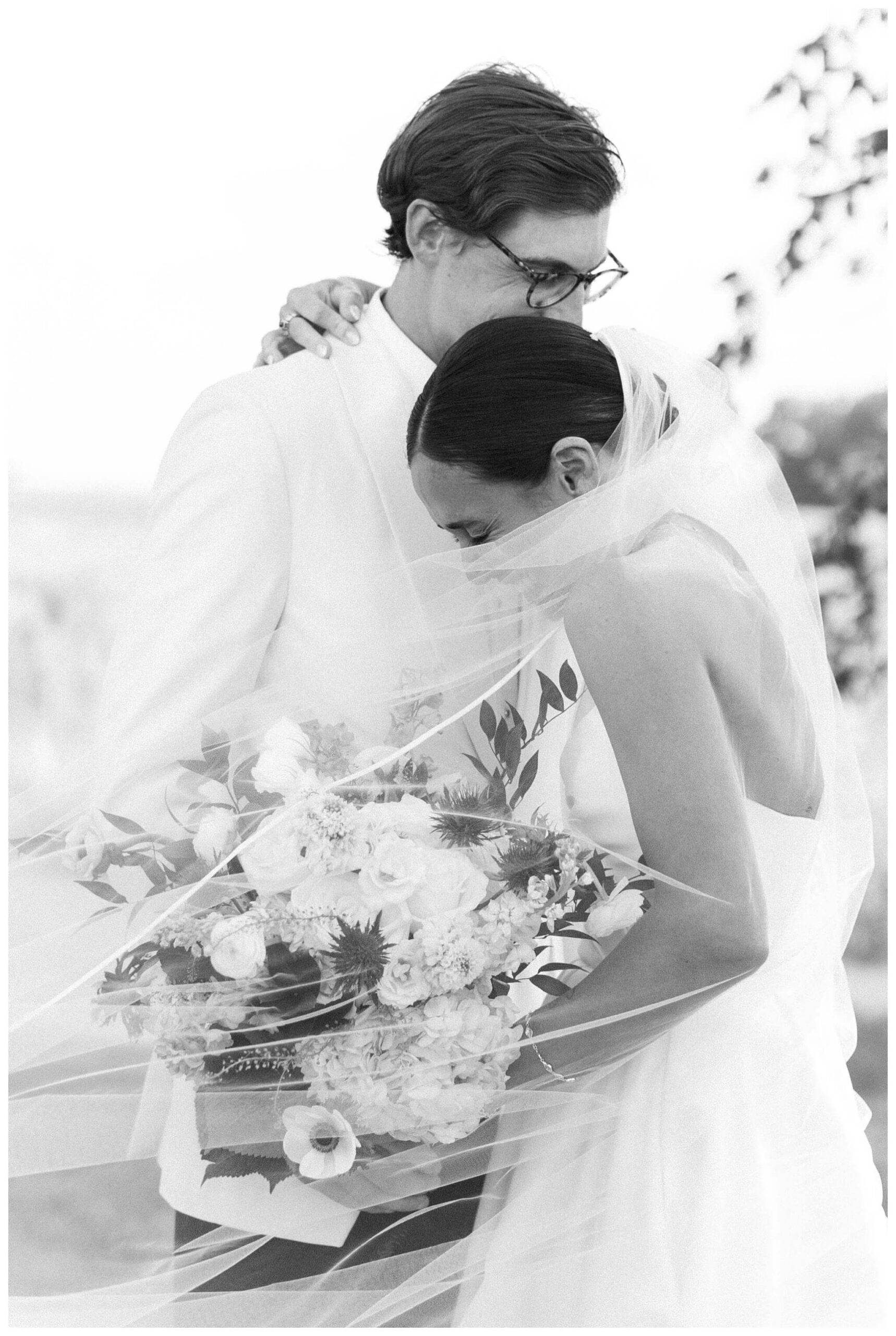 refined black and white wedding at a white barn etre farms in saint joseph michigan by josh and andrea photography 