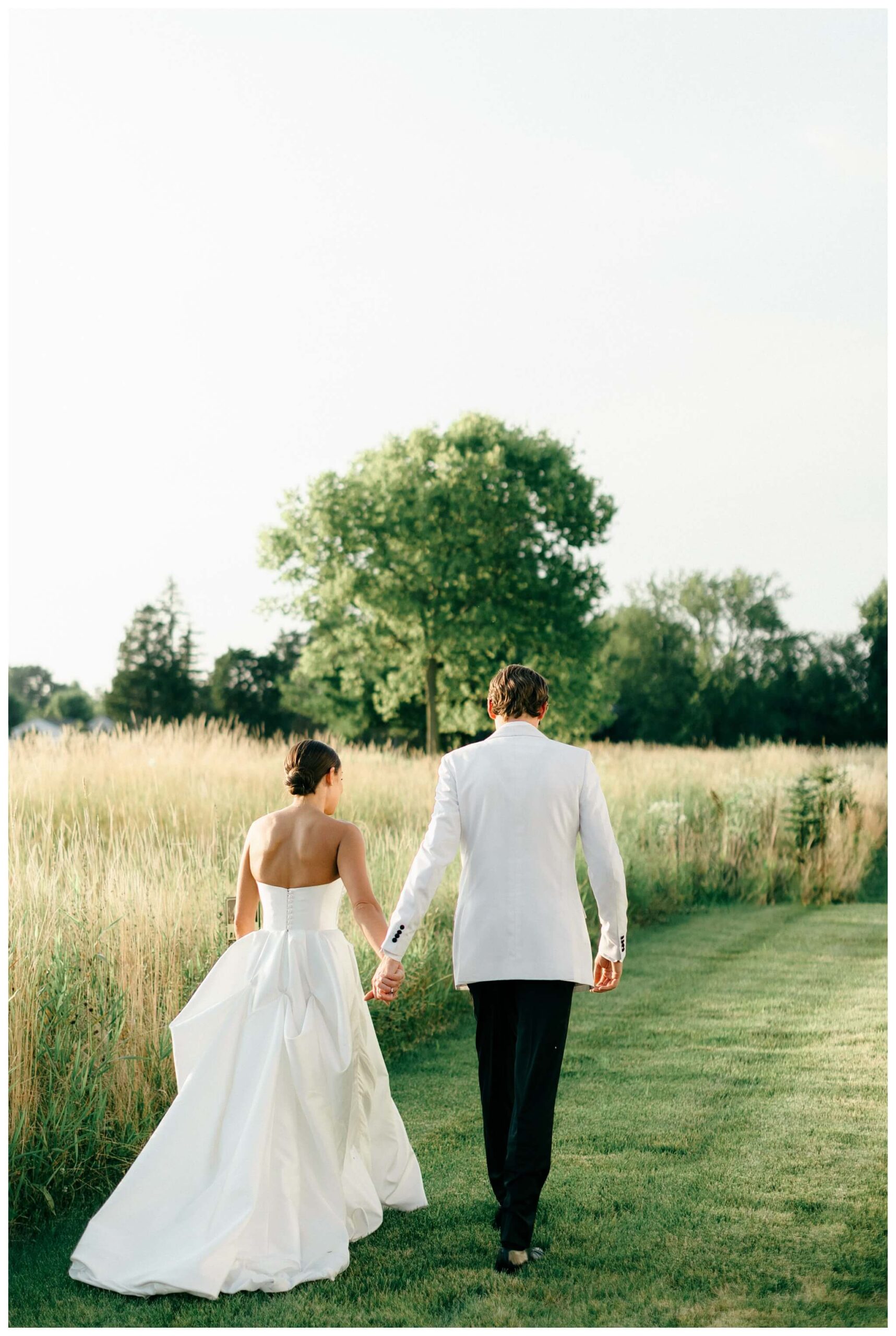 refined black and white wedding at a white barn etre farms in saint joseph michigan by josh and andrea photography 