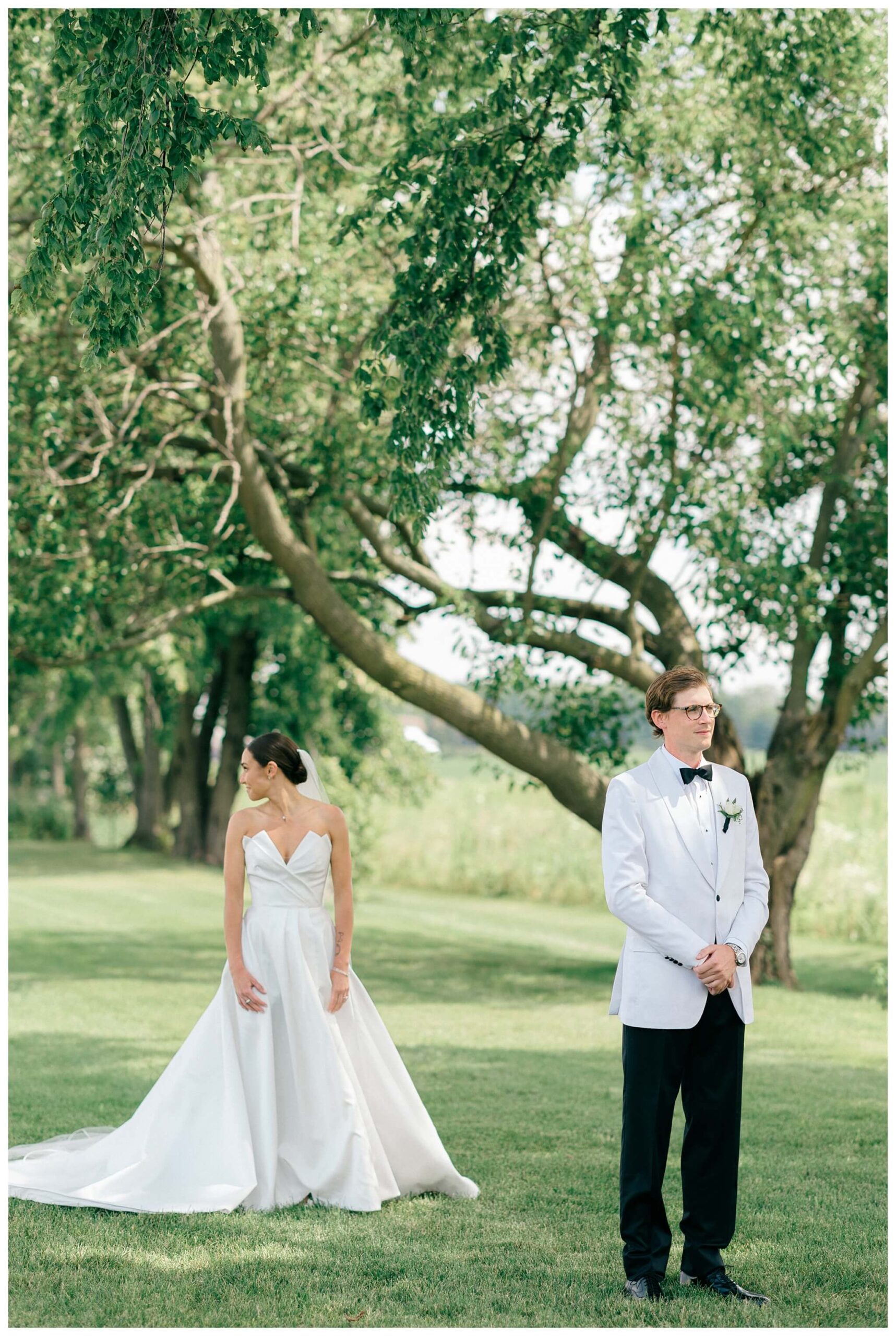 refined black and white wedding at a white barn etre farms in saint joseph michigan by josh and andrea photography 