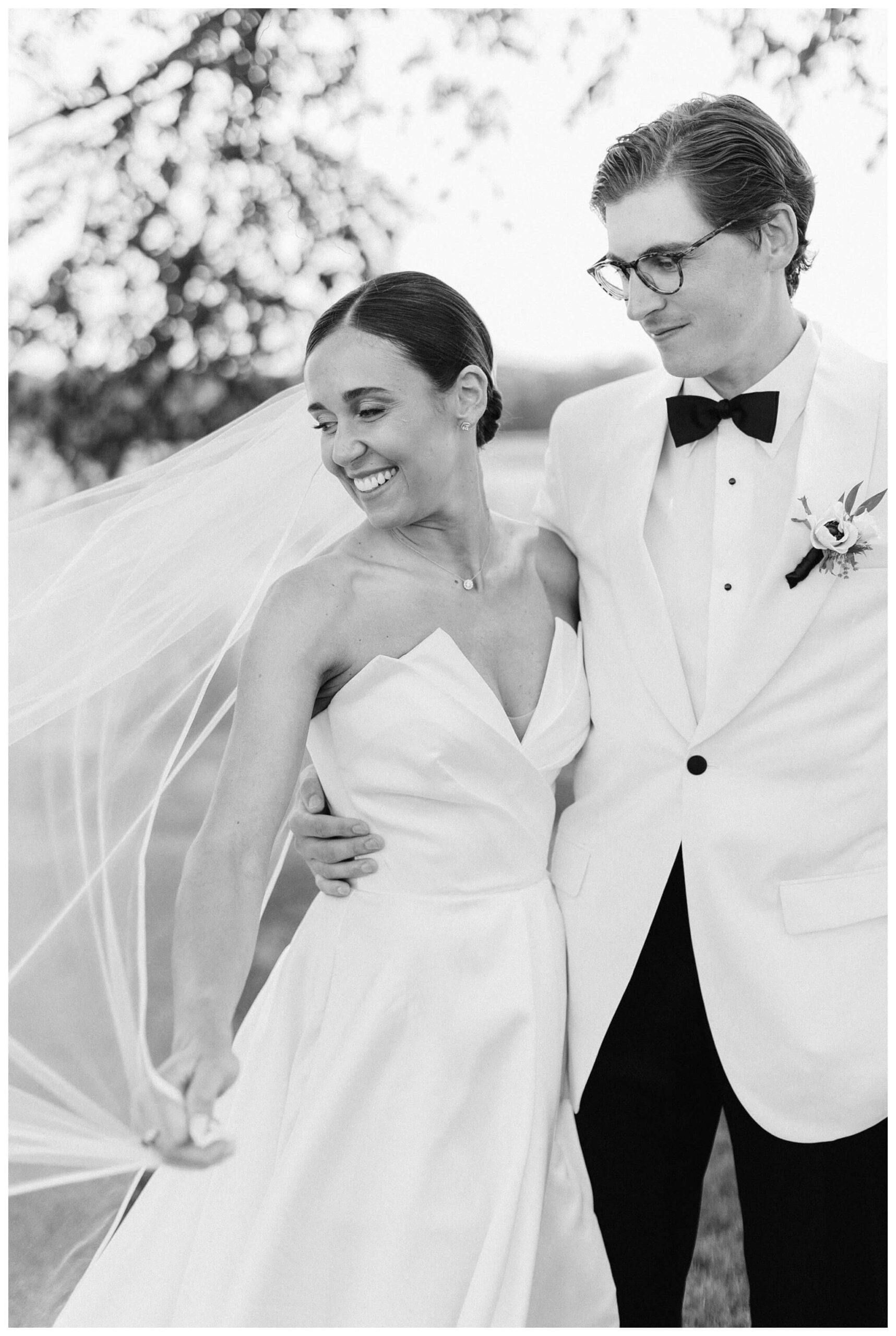 refined black and white wedding at a white barn etre farms in saint joseph michigan by josh and andrea photography 