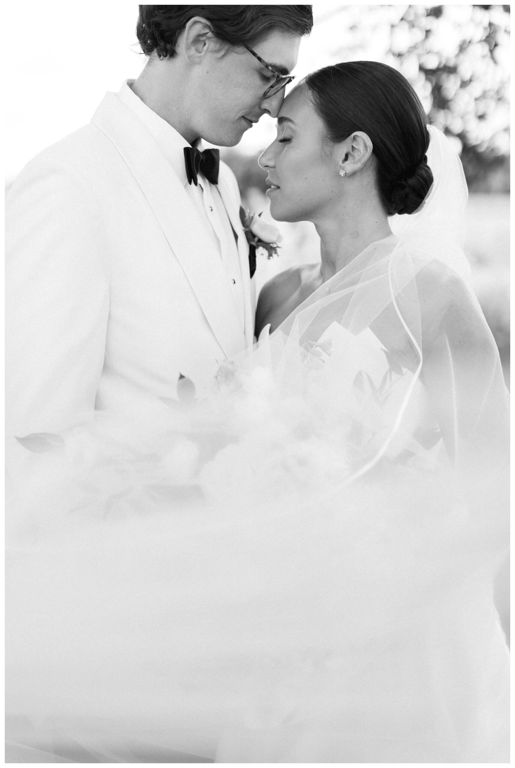 refined black and white wedding at a white barn etre farms in saint joseph michigan by josh and andrea photography 