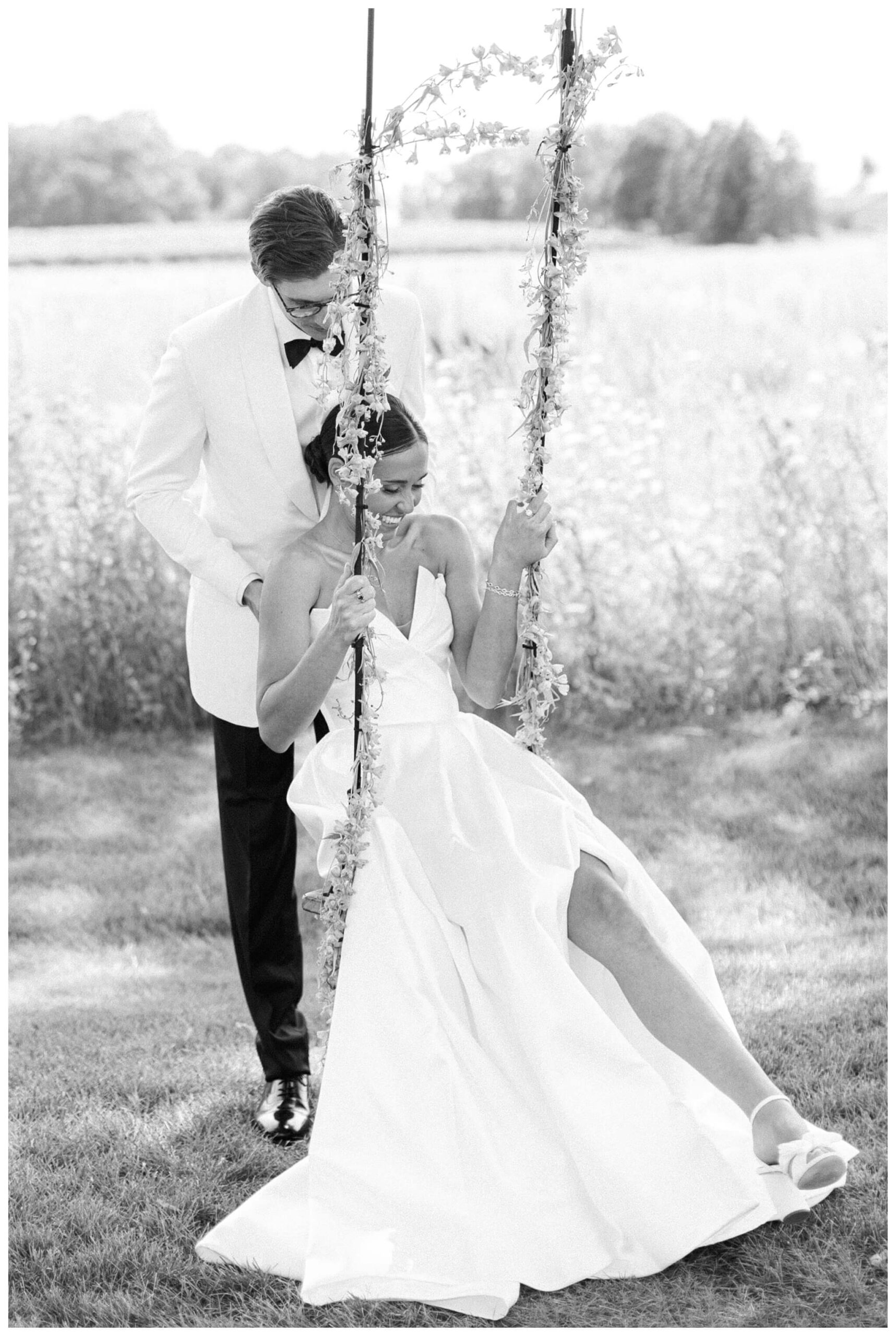 refined black and white wedding at a white barn etre farms in saint joseph michigan by josh and andrea photography 