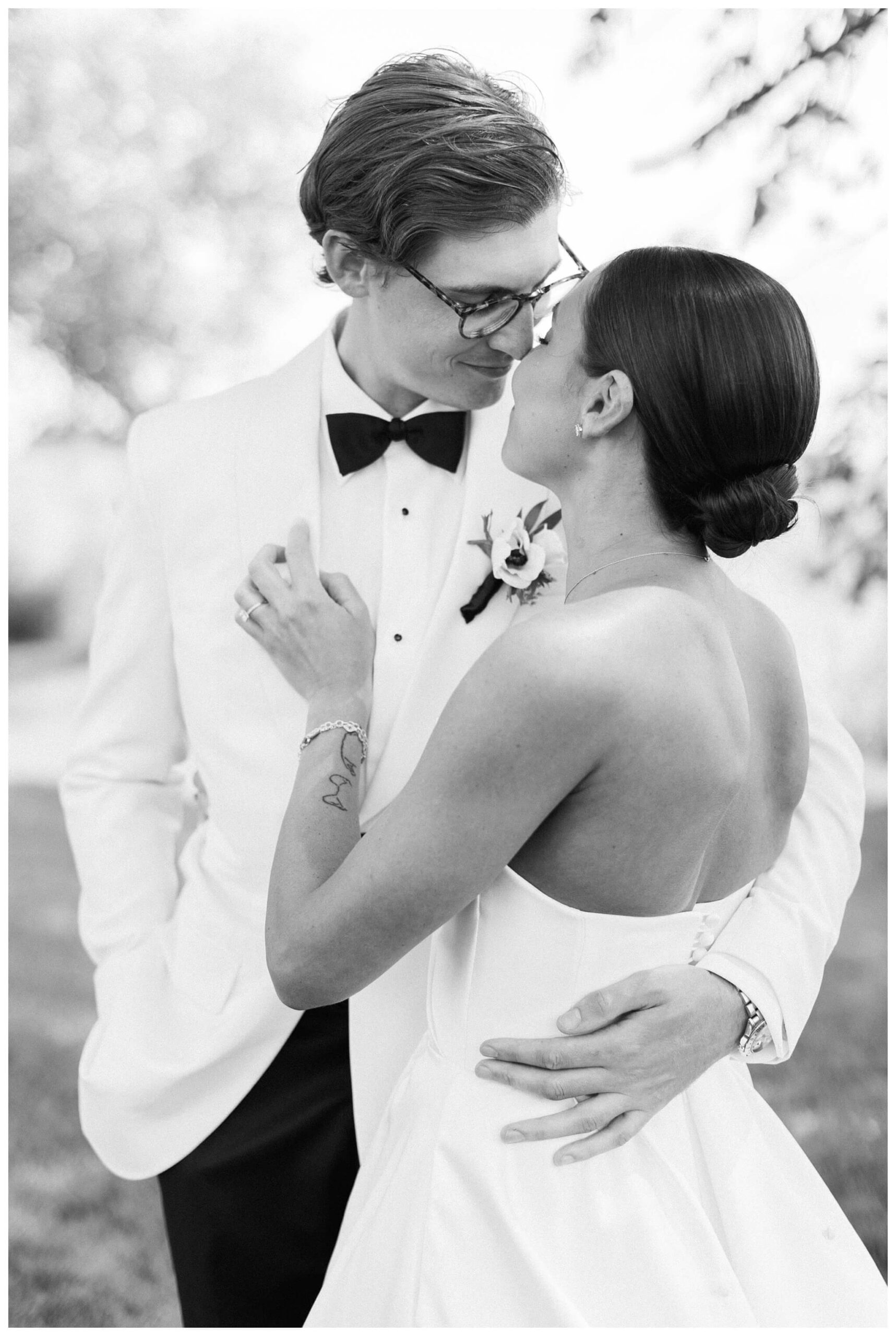 refined black and white wedding at a white barn etre farms in saint joseph michigan by josh and andrea photography 