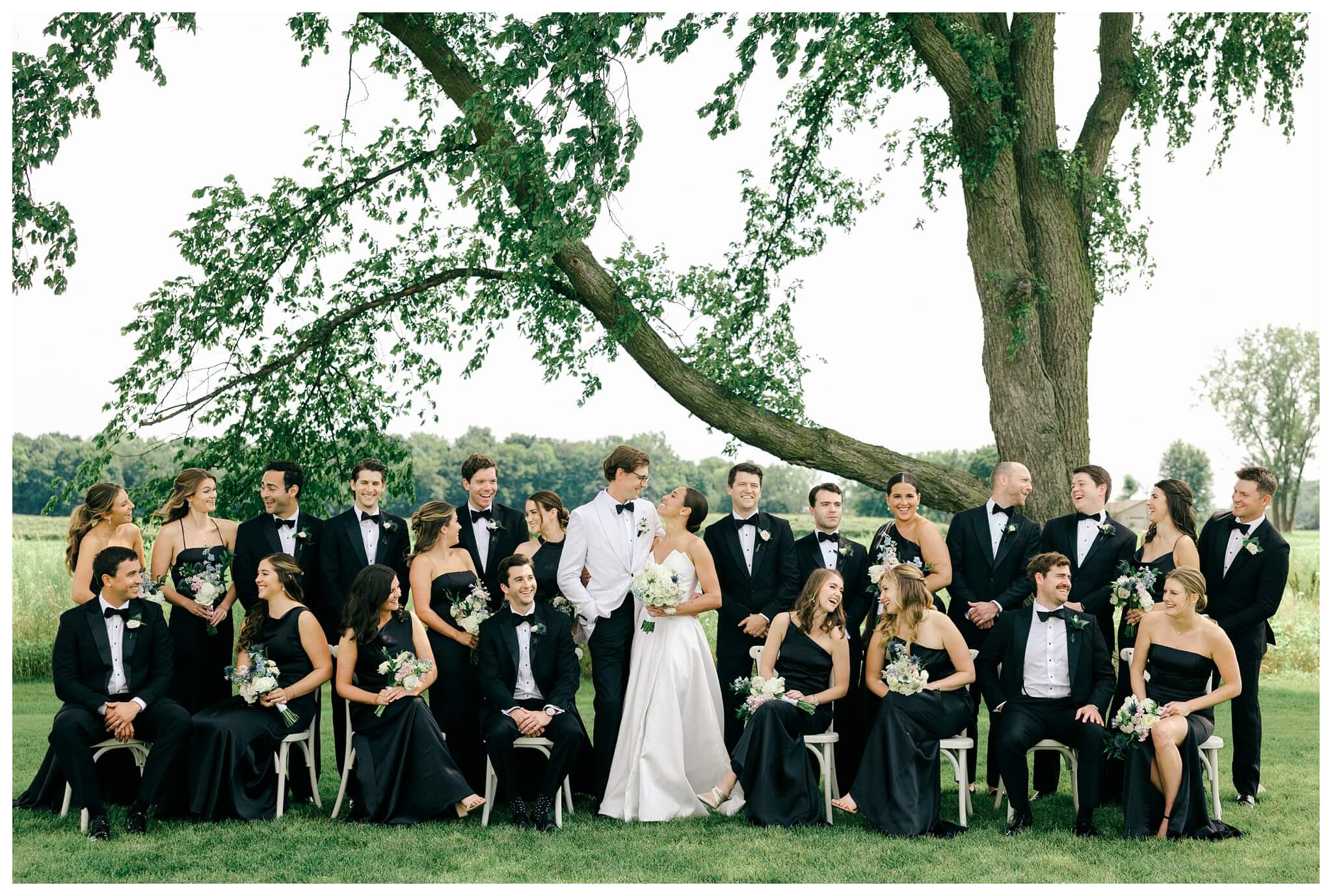 refined black and white wedding at a white barn etre farms in saint joseph michigan by josh and andrea photography 