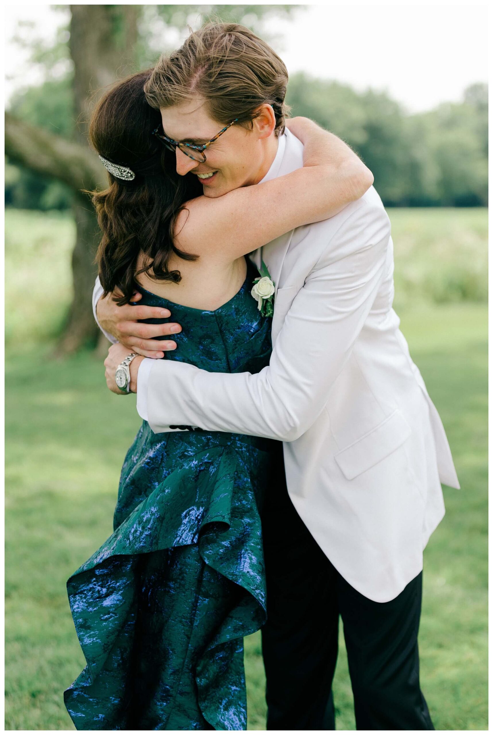 refined black and white wedding at a white barn etre farms in saint joseph michigan by josh and andrea photography 