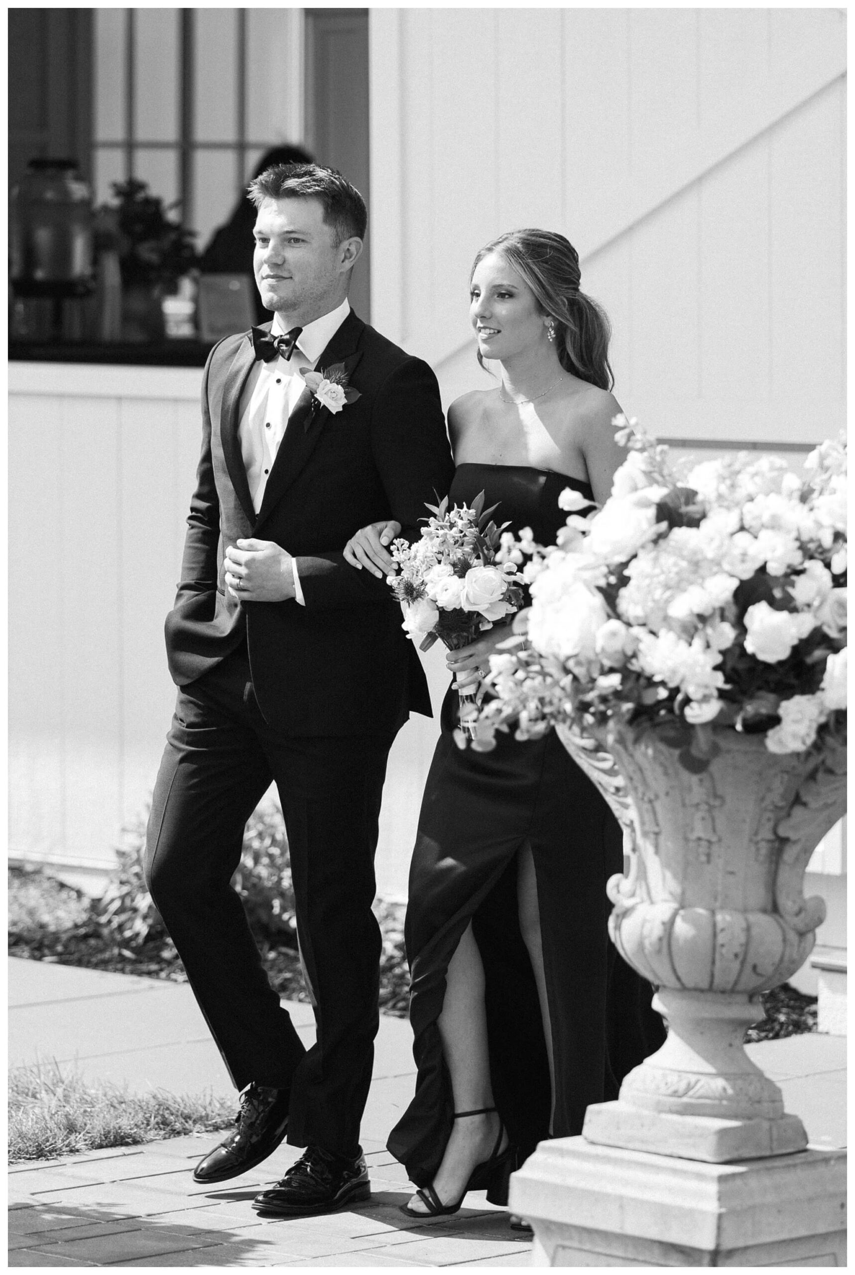 refined black and white wedding at a white barn etre farms in saint joseph michigan by josh and andrea photography 