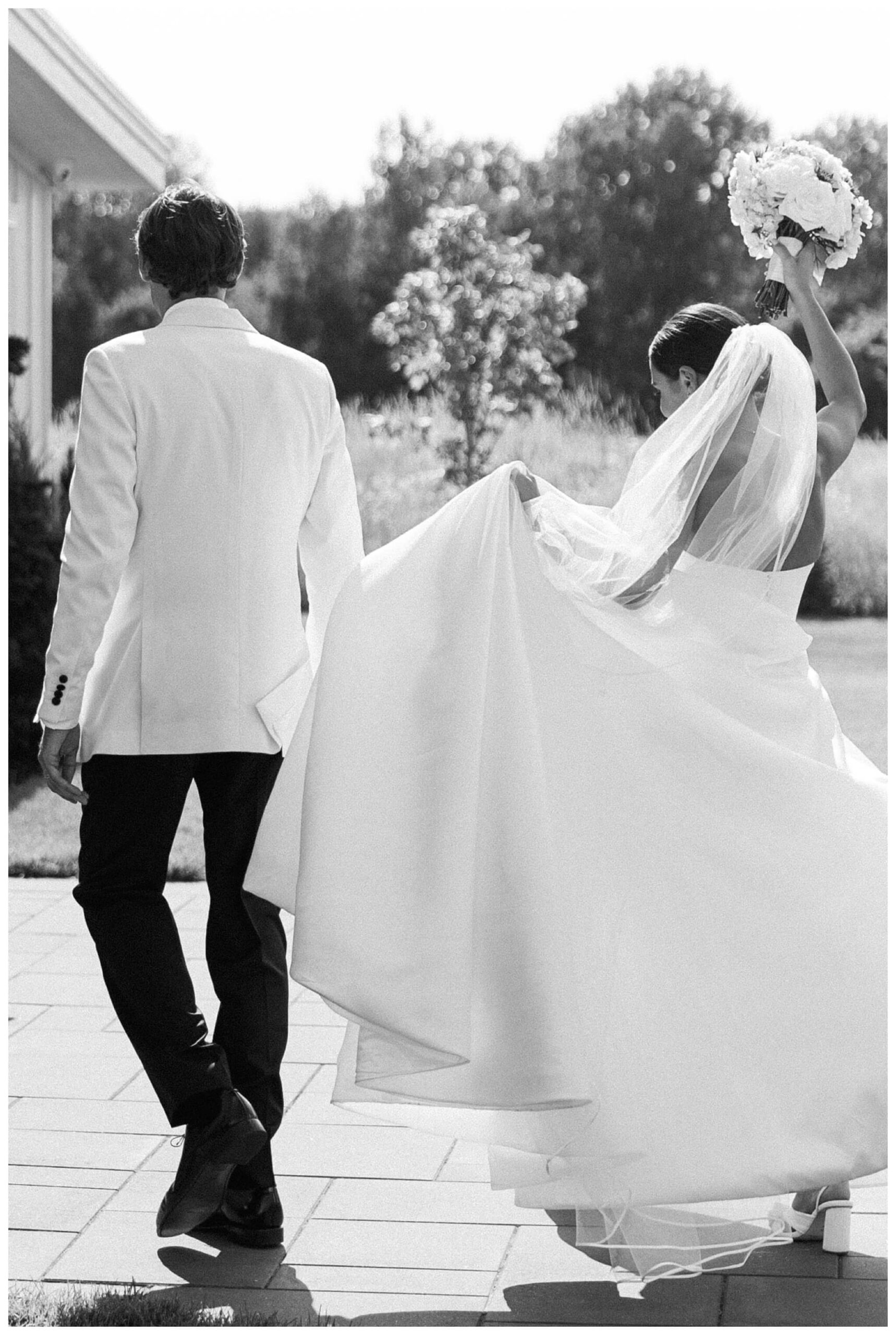 refined black and white wedding at a white barn etre farms in saint joseph michigan by josh and andrea photography 