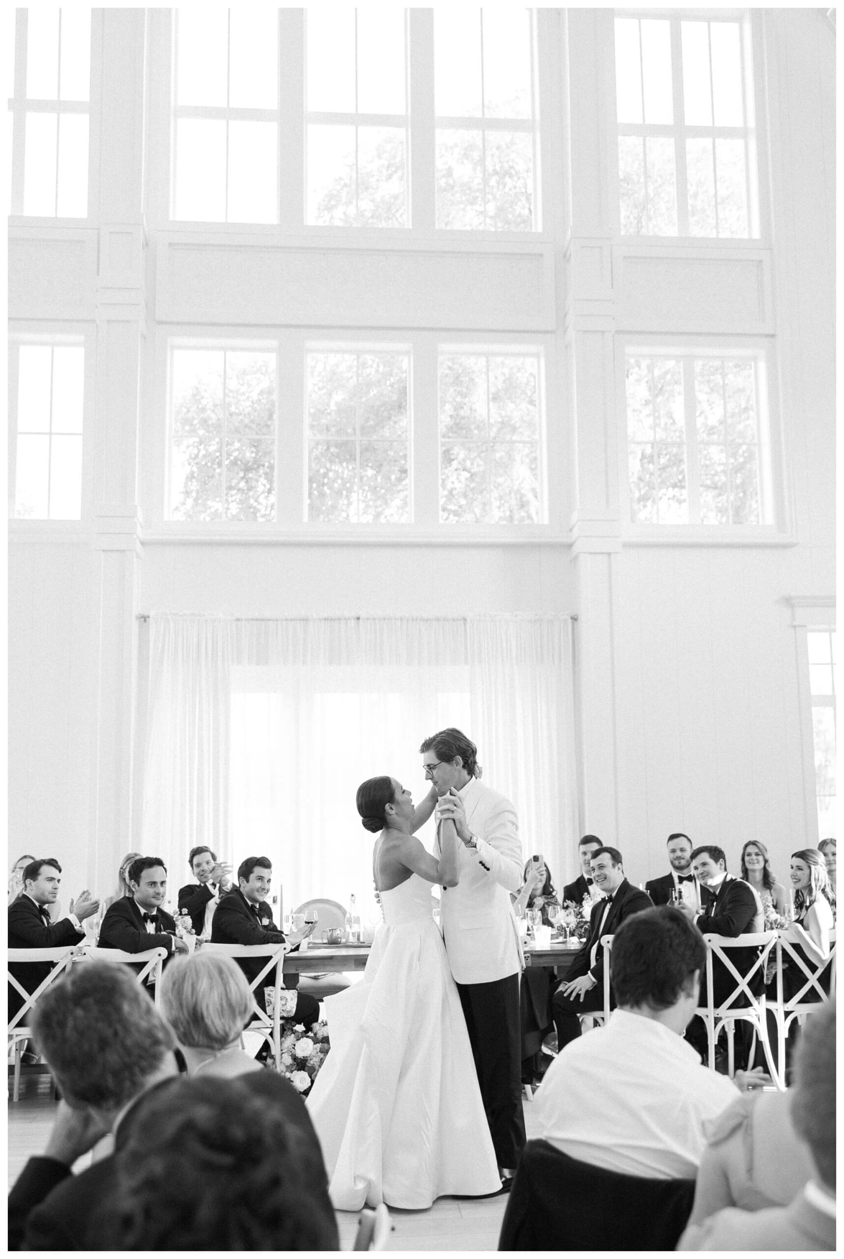 refined black and white wedding at a white barn etre farms in saint joseph michigan by josh and andrea photography 