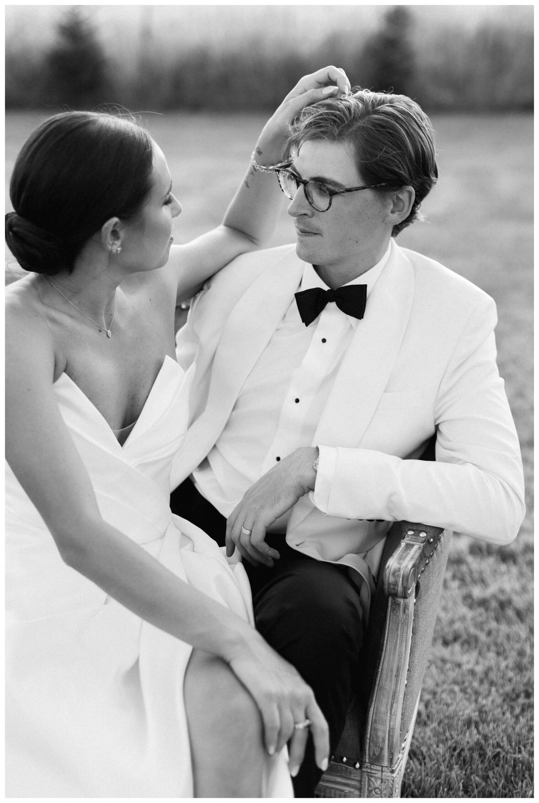 refined black and white wedding at a white barn etre farms in saint joseph michigan by josh and andrea photography 