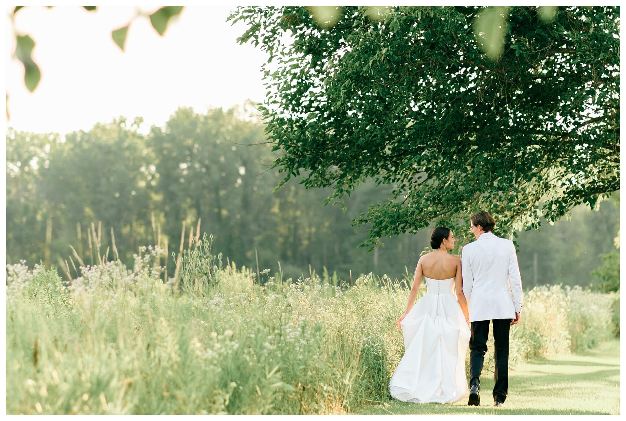 refined black and white wedding at a white barn etre farms in saint joseph michigan by josh and andrea photography 