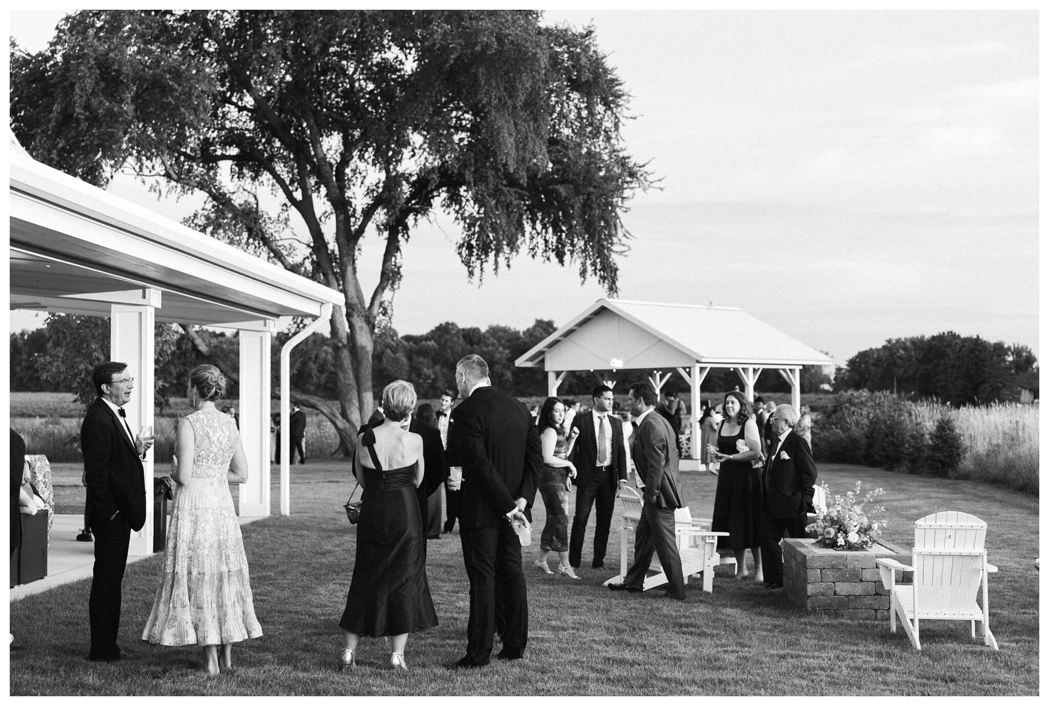 refined black and white wedding at a white barn etre farms in saint joseph michigan by josh and andrea photography 