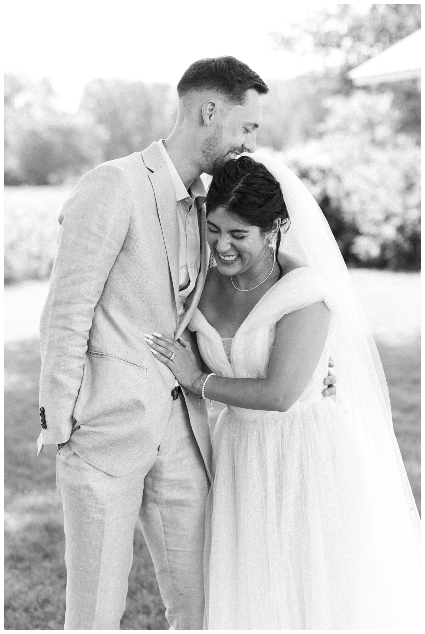 white barn wedding with parasols at etre farms in saint joseph michigan by josh and andrea photography