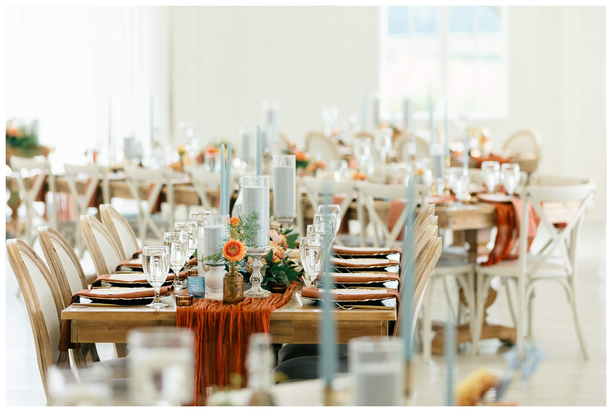 white barn wedding with parasols at etre farms in saint joseph michigan by josh and andrea photography