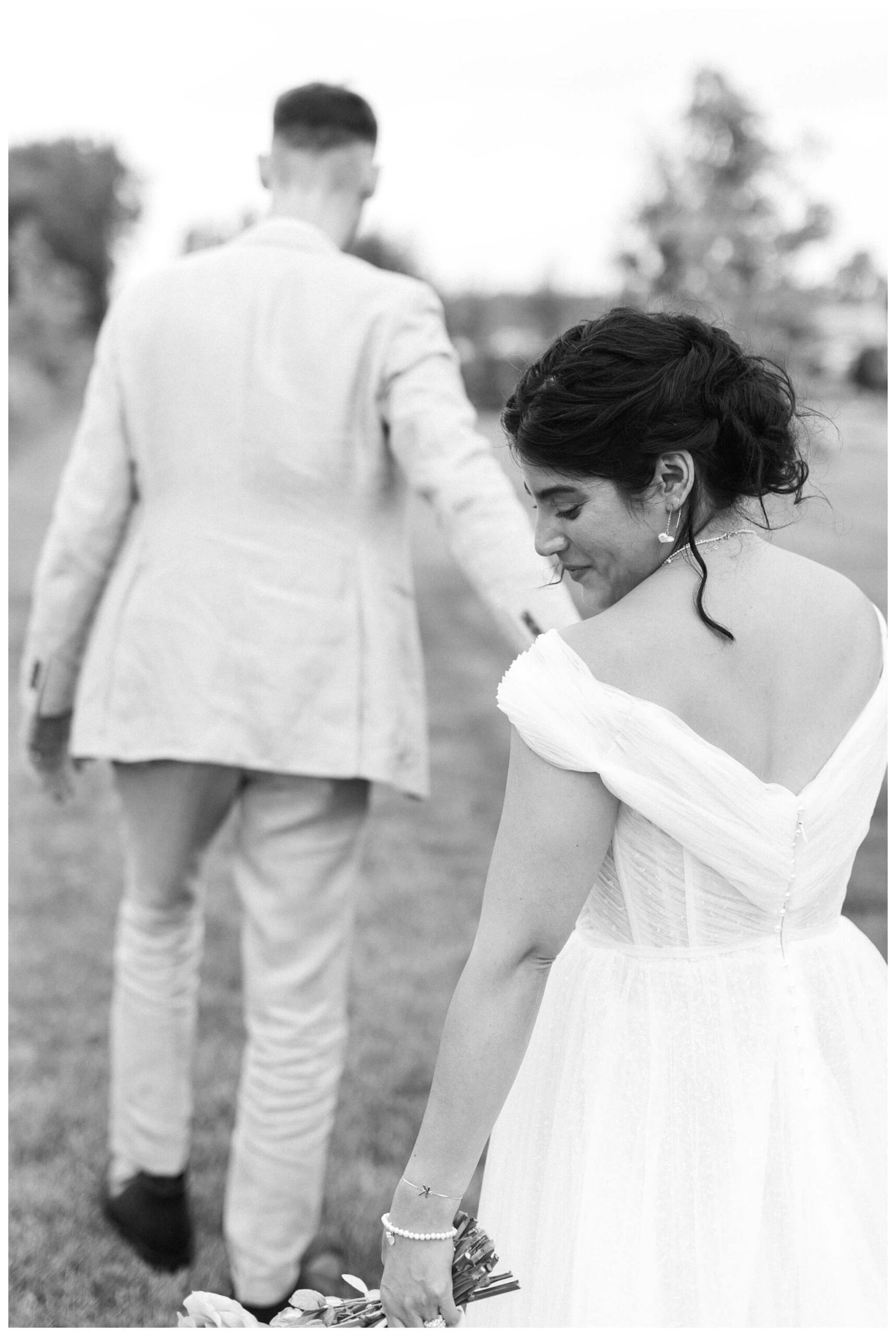 white barn wedding with parasols at etre farms in saint joseph michigan by josh and andrea photography