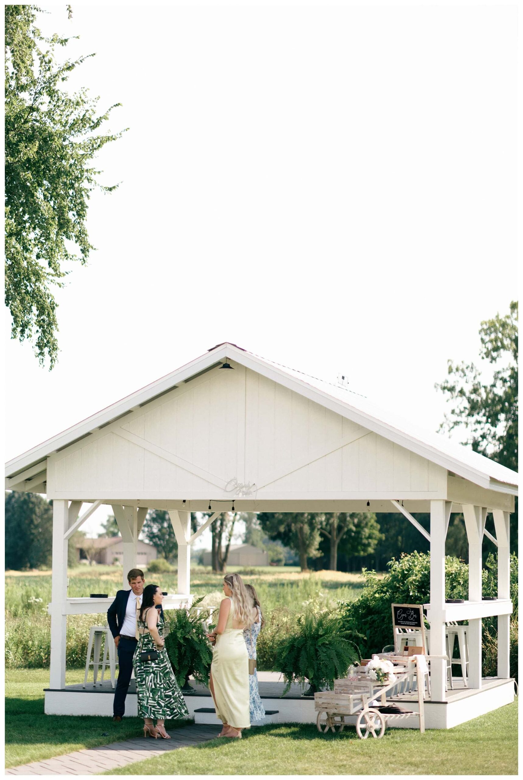 gorgeous white barn wedding at etre farms near saint joseph michigan by josh and andrea photography