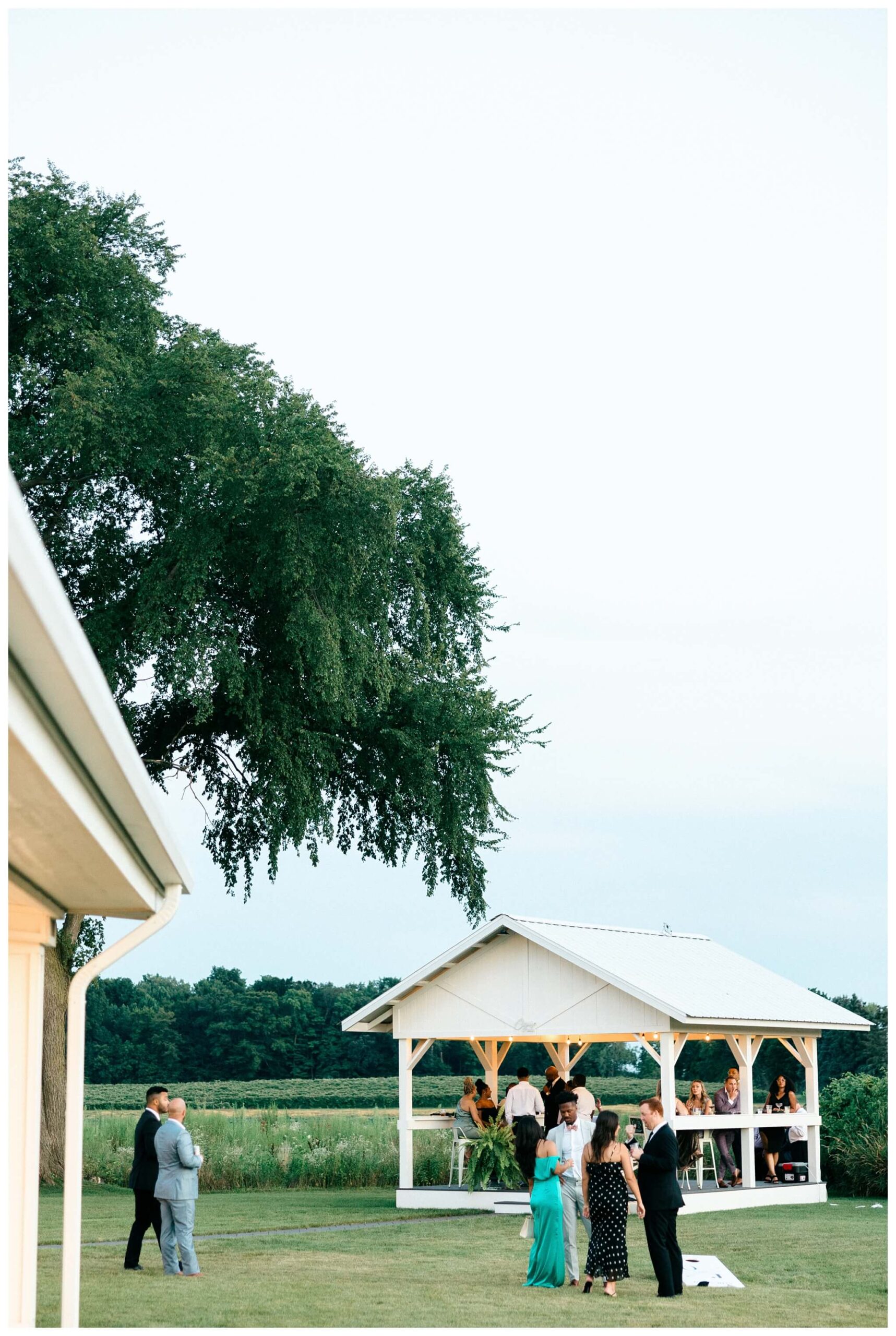 gorgeous white barn wedding at etre farms near saint joseph michigan by josh and andrea photography