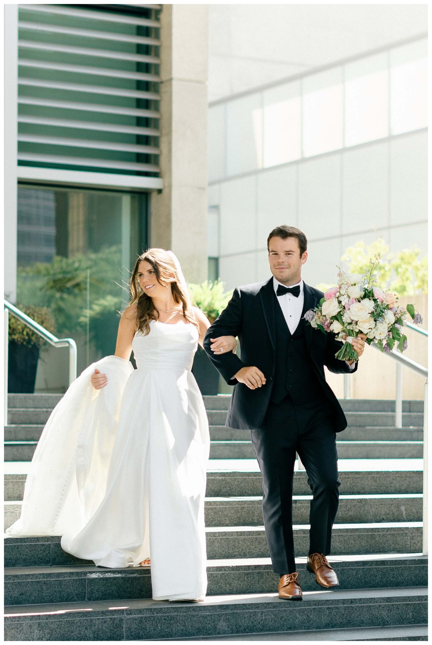 timeless joyful downtown wedding in grand rapids michigan at new vintage place and grand rapids art museum by josh and andrea photography