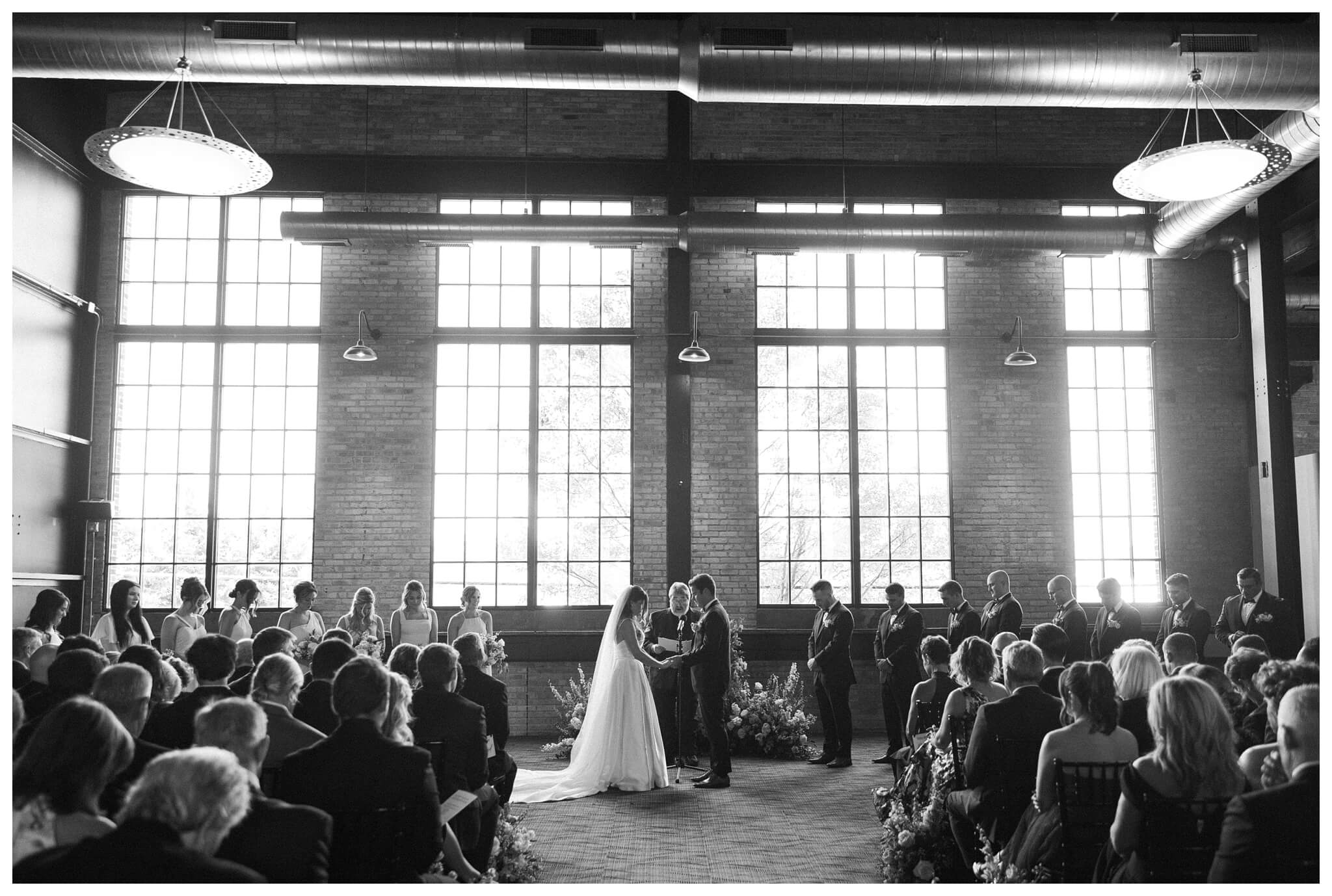 timeless joyful downtown wedding in grand rapids michigan at new vintage place and grand rapids art museum by josh and andrea photography