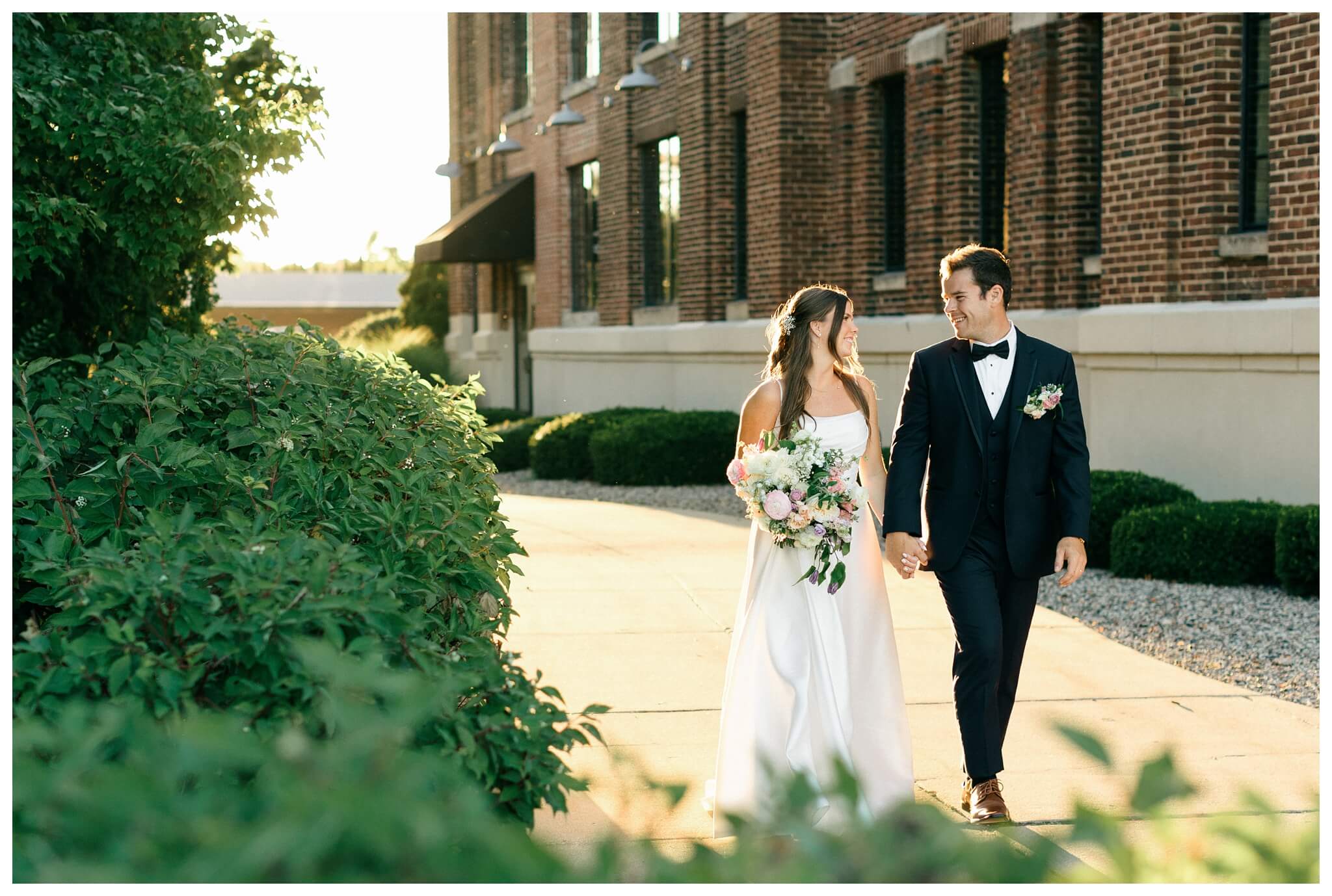 timeless joyful downtown wedding in grand rapids michigan at new vintage place and grand rapids art museum by josh and andrea photography