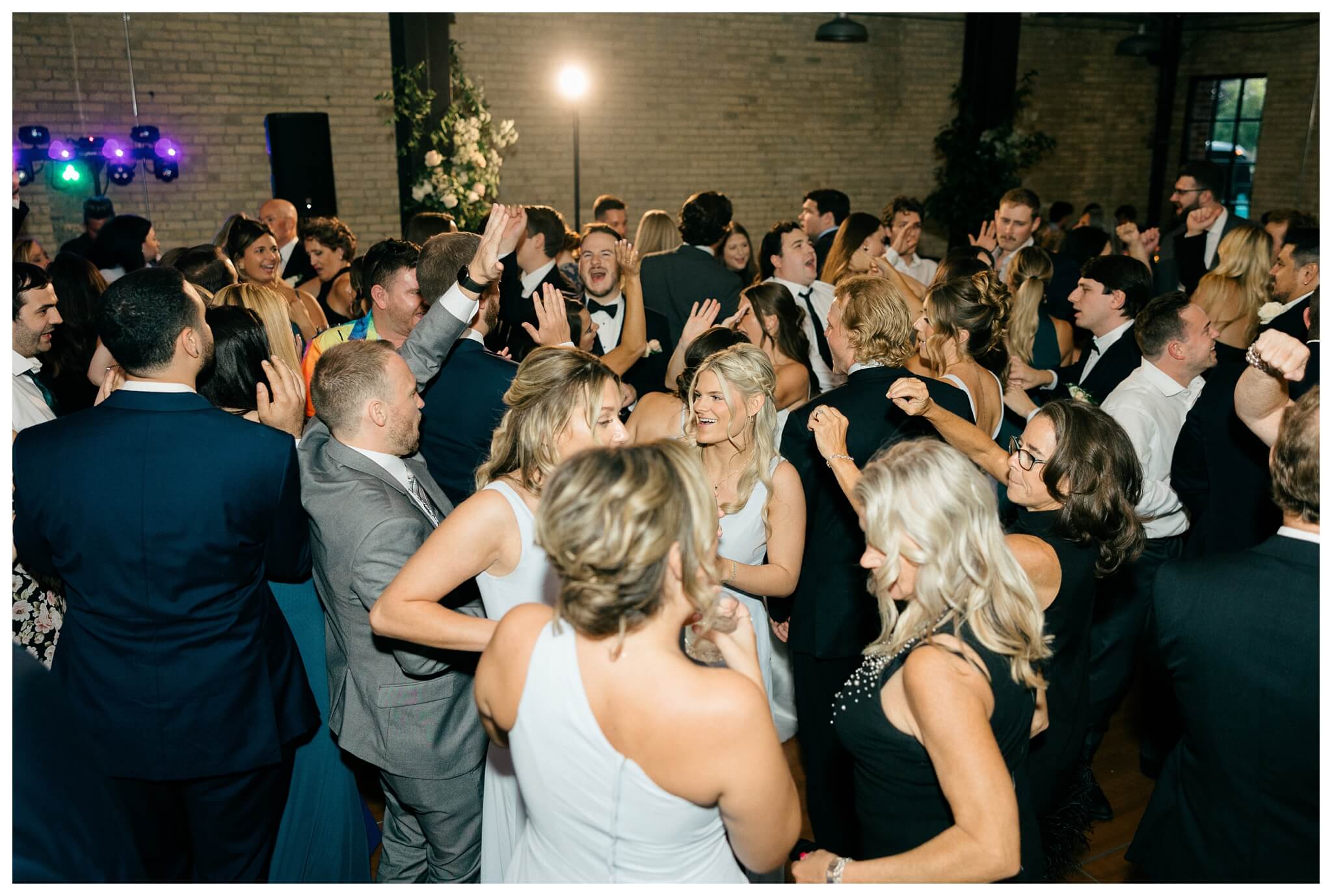 timeless joyful downtown wedding in grand rapids michigan at new vintage place and grand rapids art museum by josh and andrea photography