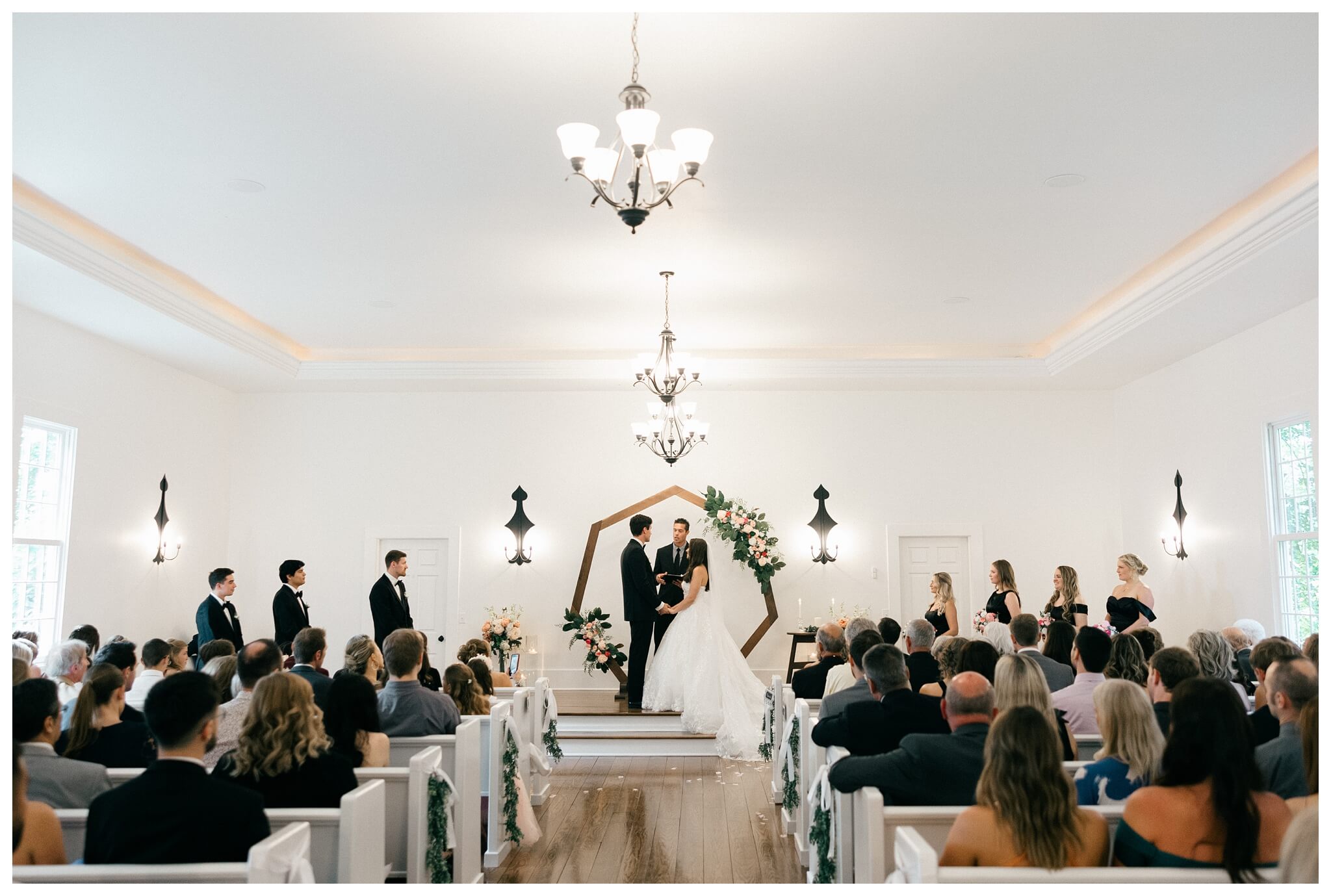 romantic white chapel wedding in niles michigan at morris estate with classic car by josh and andrea photography