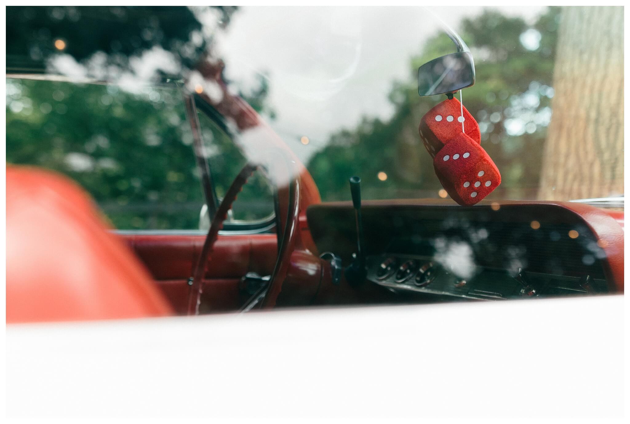 romantic white chapel wedding in niles michigan at morris estate with classic car by josh and andrea photography