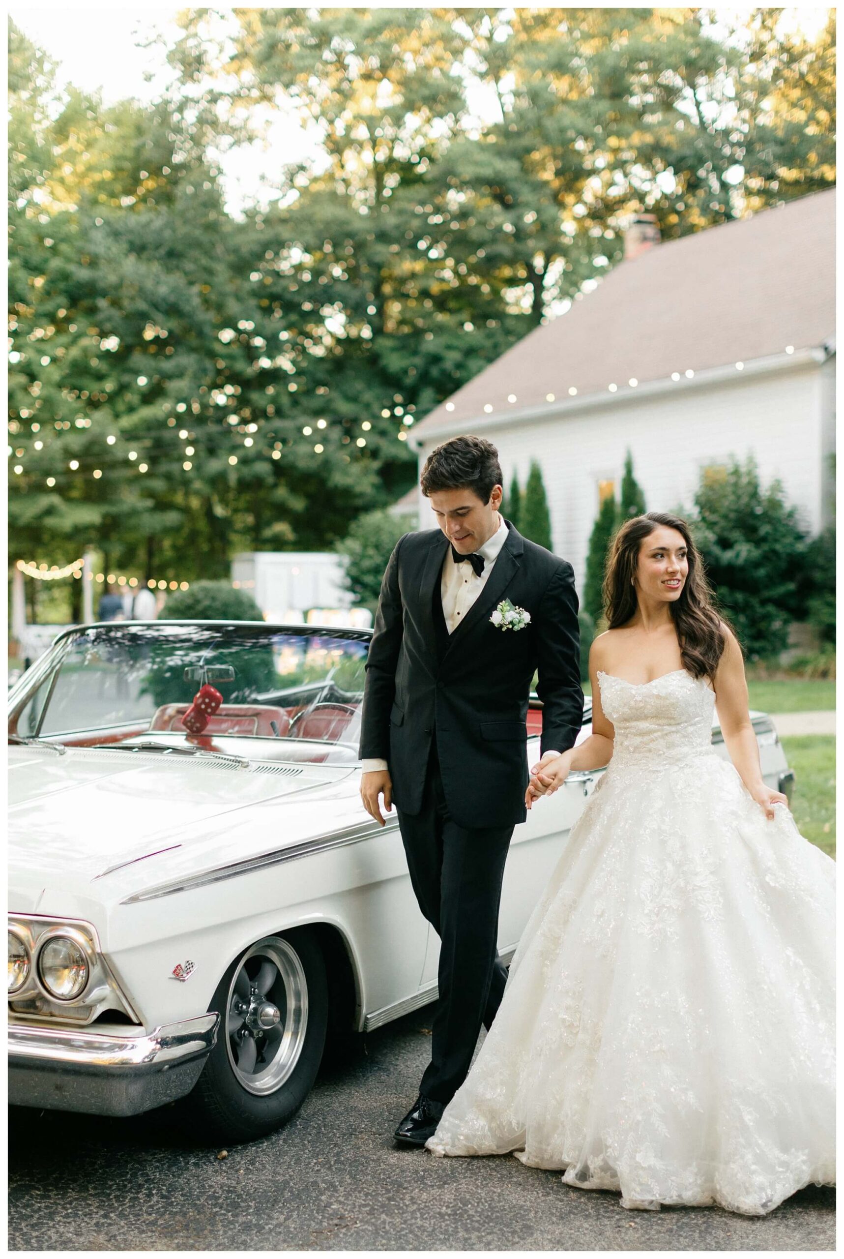 romantic white chapel wedding in niles michigan at morris estate with classic car by josh and andrea photography