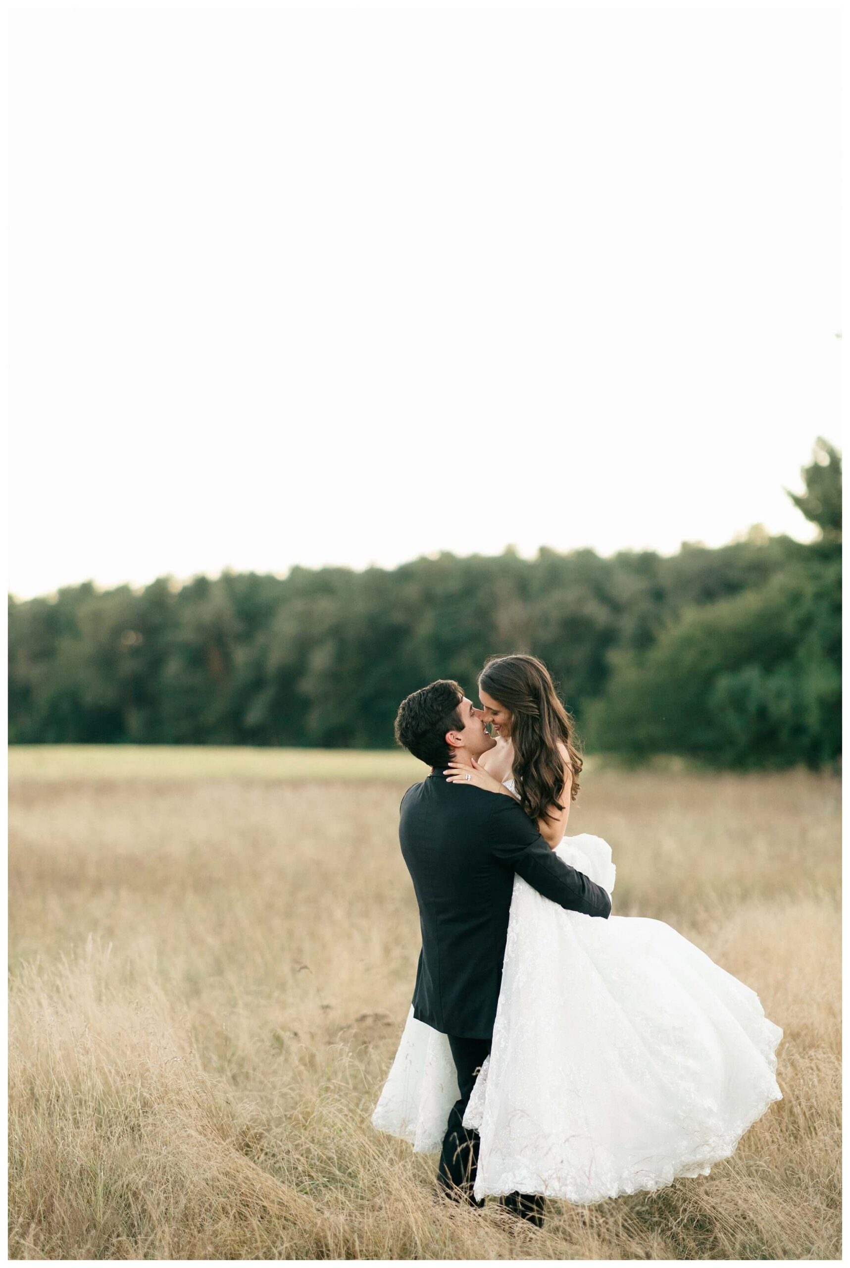 romantic white chapel wedding in niles michigan at morris estate with classic car by josh and andrea photography