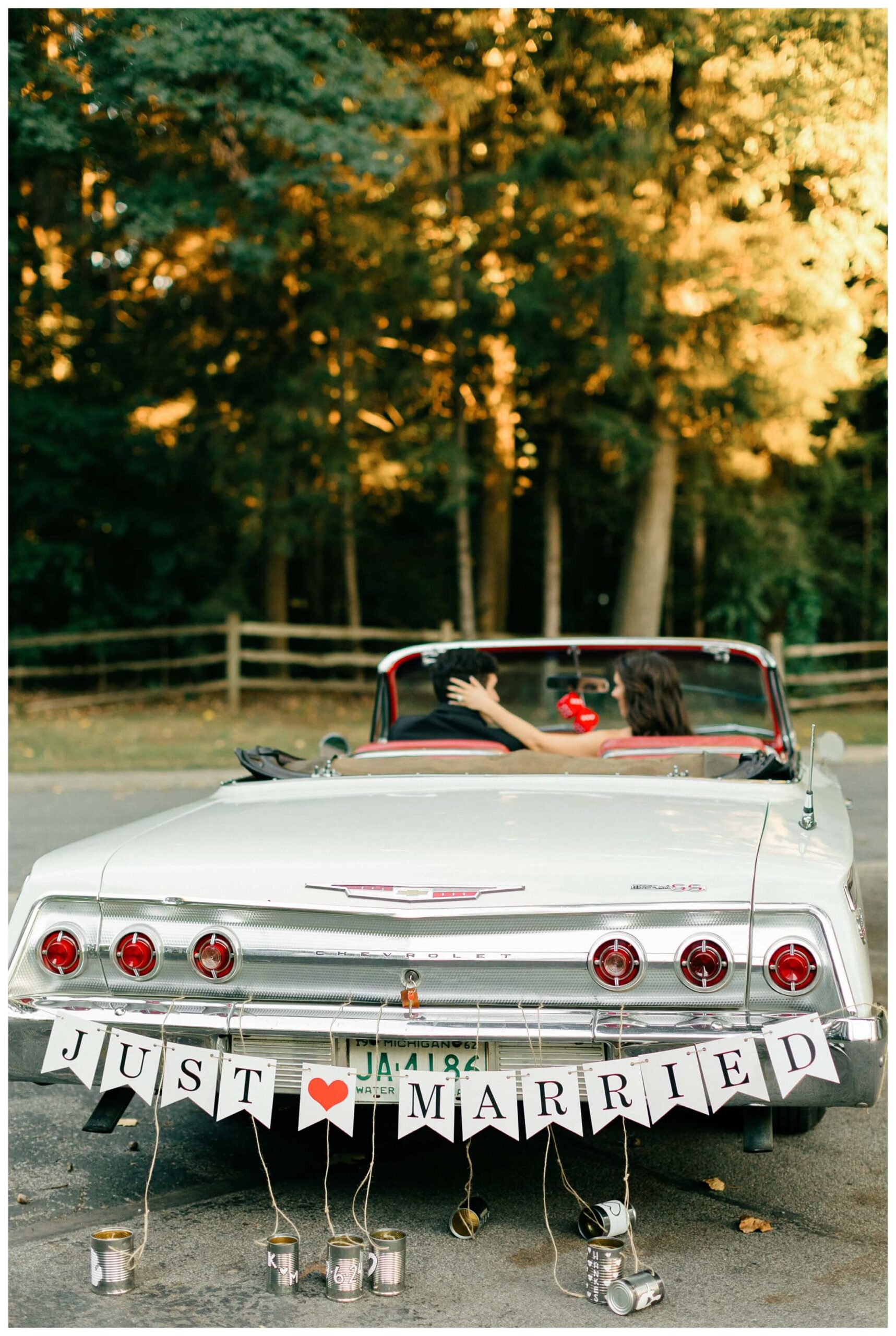 romantic white chapel wedding in niles michigan at morris estate with classic car by josh and andrea photography