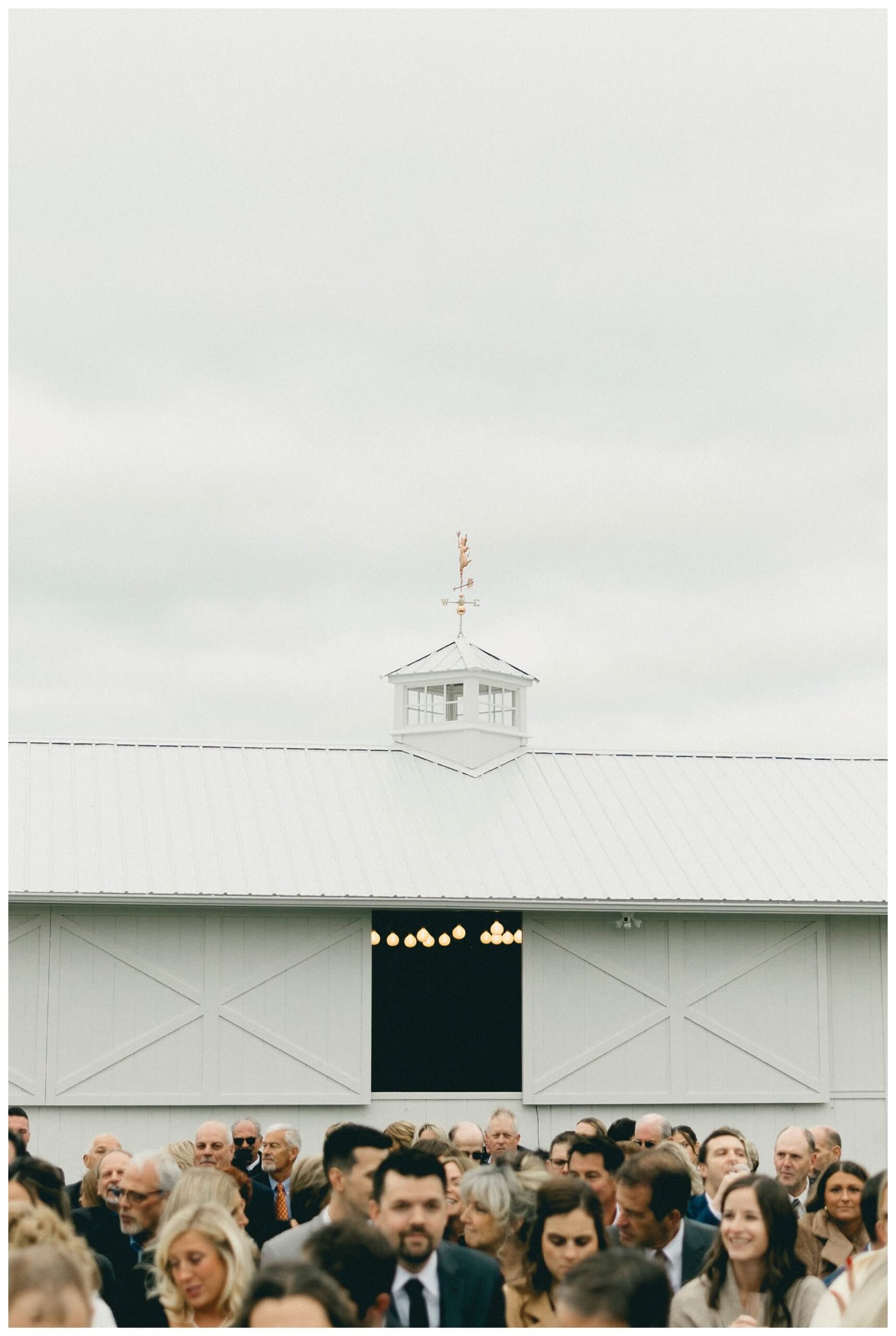 classy sophisticated black tie wedding at a white barn at Etre farms in michigan by josh and andrea photography