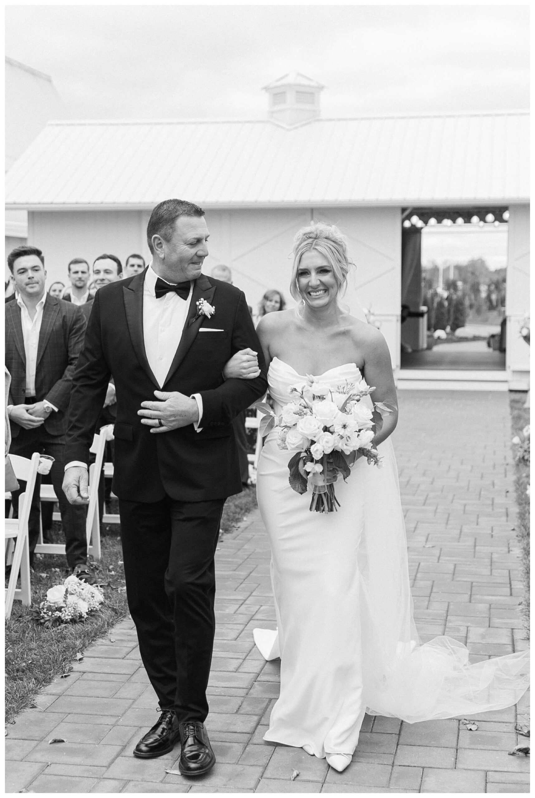 classy sophisticated black tie wedding at a white barn at Etre farms in michigan by josh and andrea photography