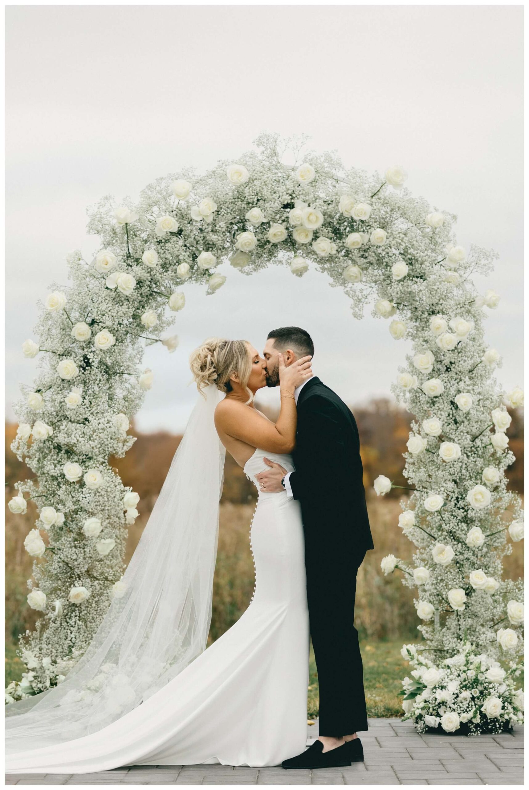 classy sophisticated black tie wedding at a white barn at Etre farms in michigan by josh and andrea photography