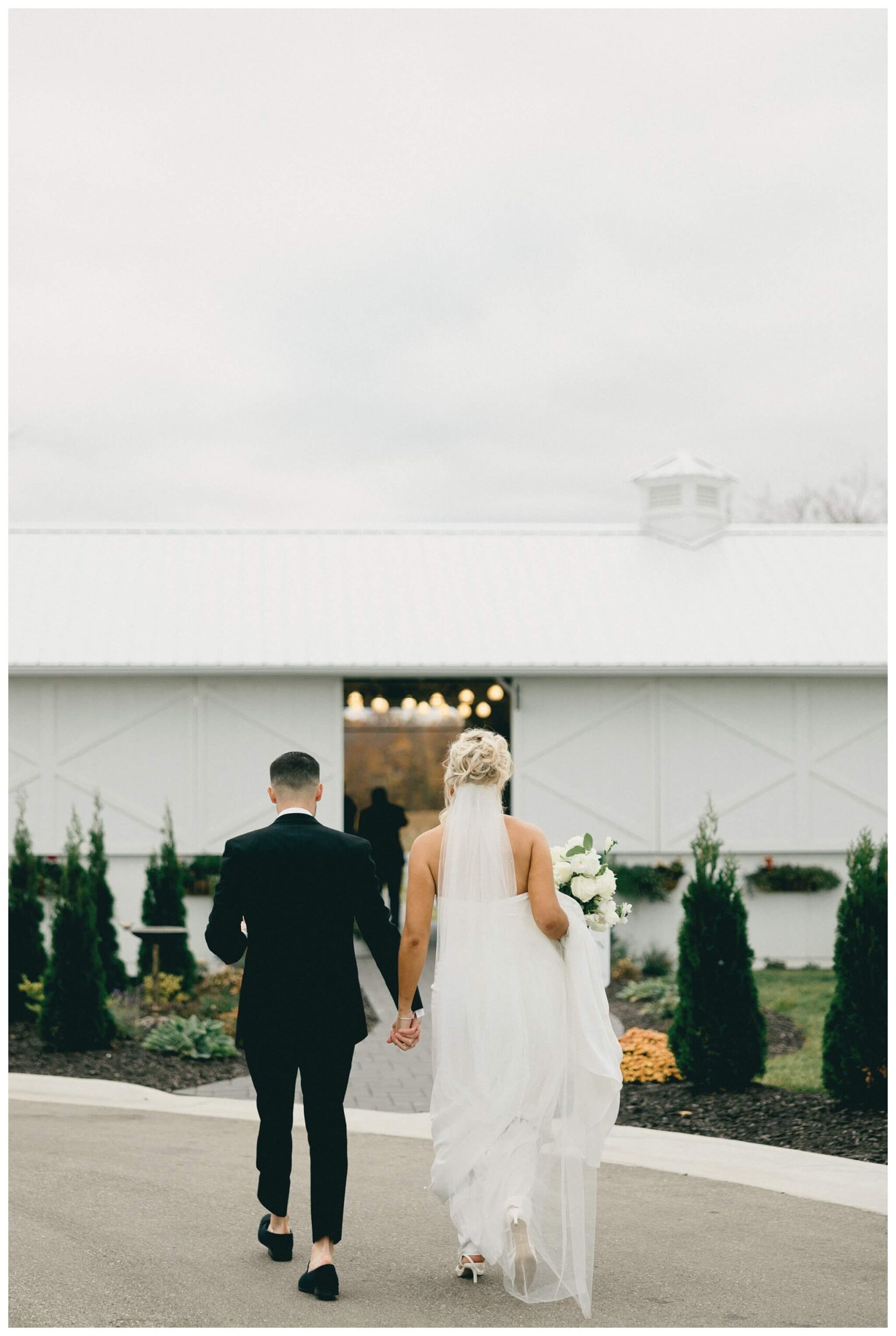 classy sophisticated black tie wedding at a white barn at Etre farms in michigan by josh and andrea photography