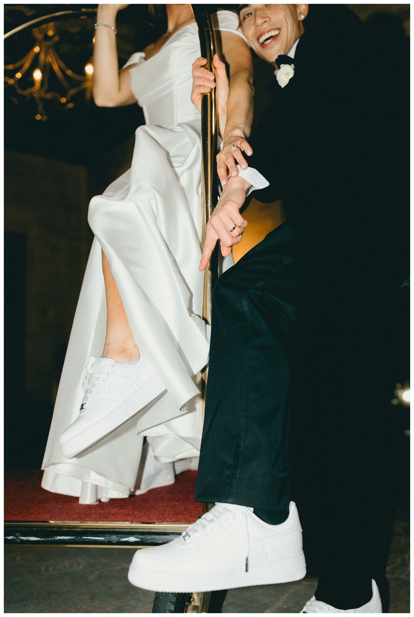 romantic timeless black tie wedding at saint johns resort with a luggage cart near detroit michigan by josh and andrea photography 