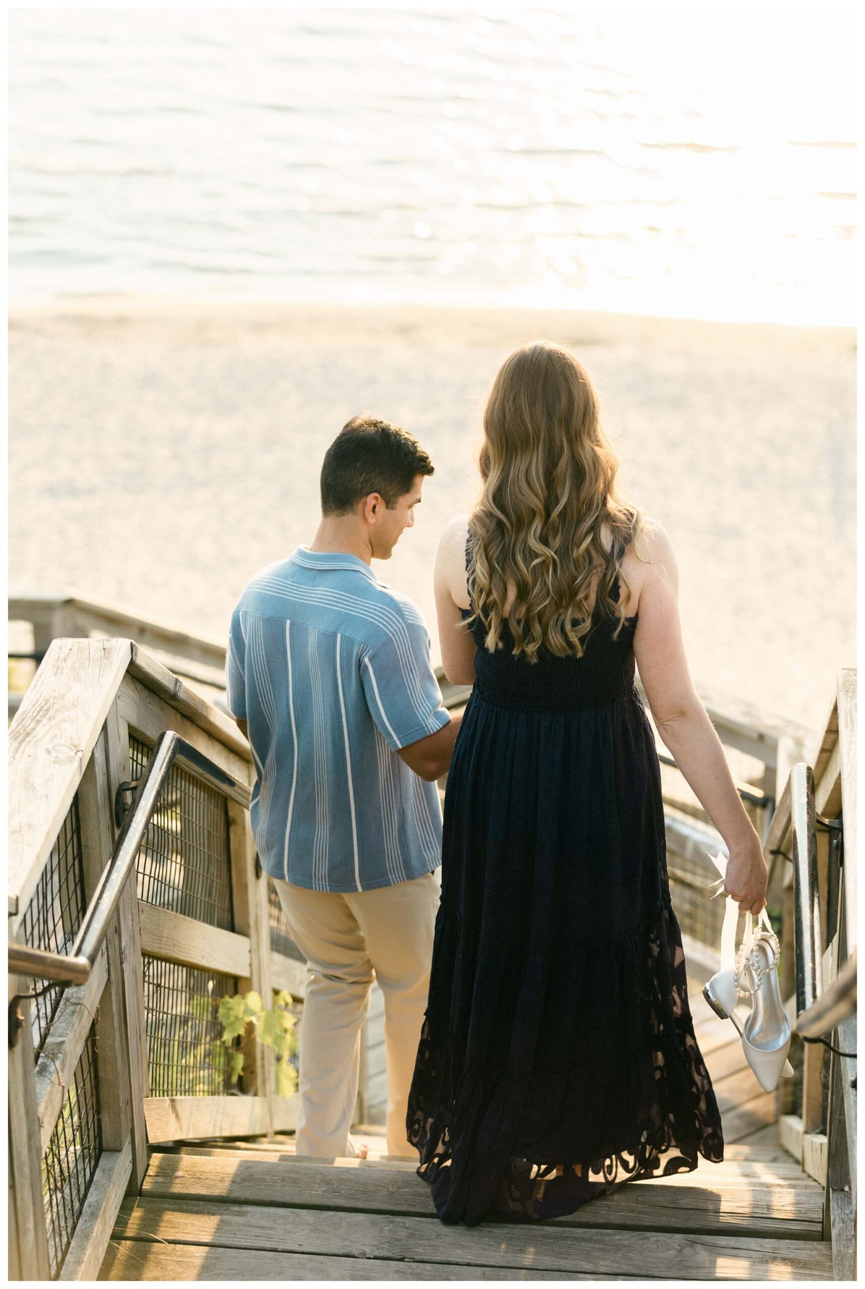 romantic beach engagement shoot at hope college at lake michigan by josh and andrea photography