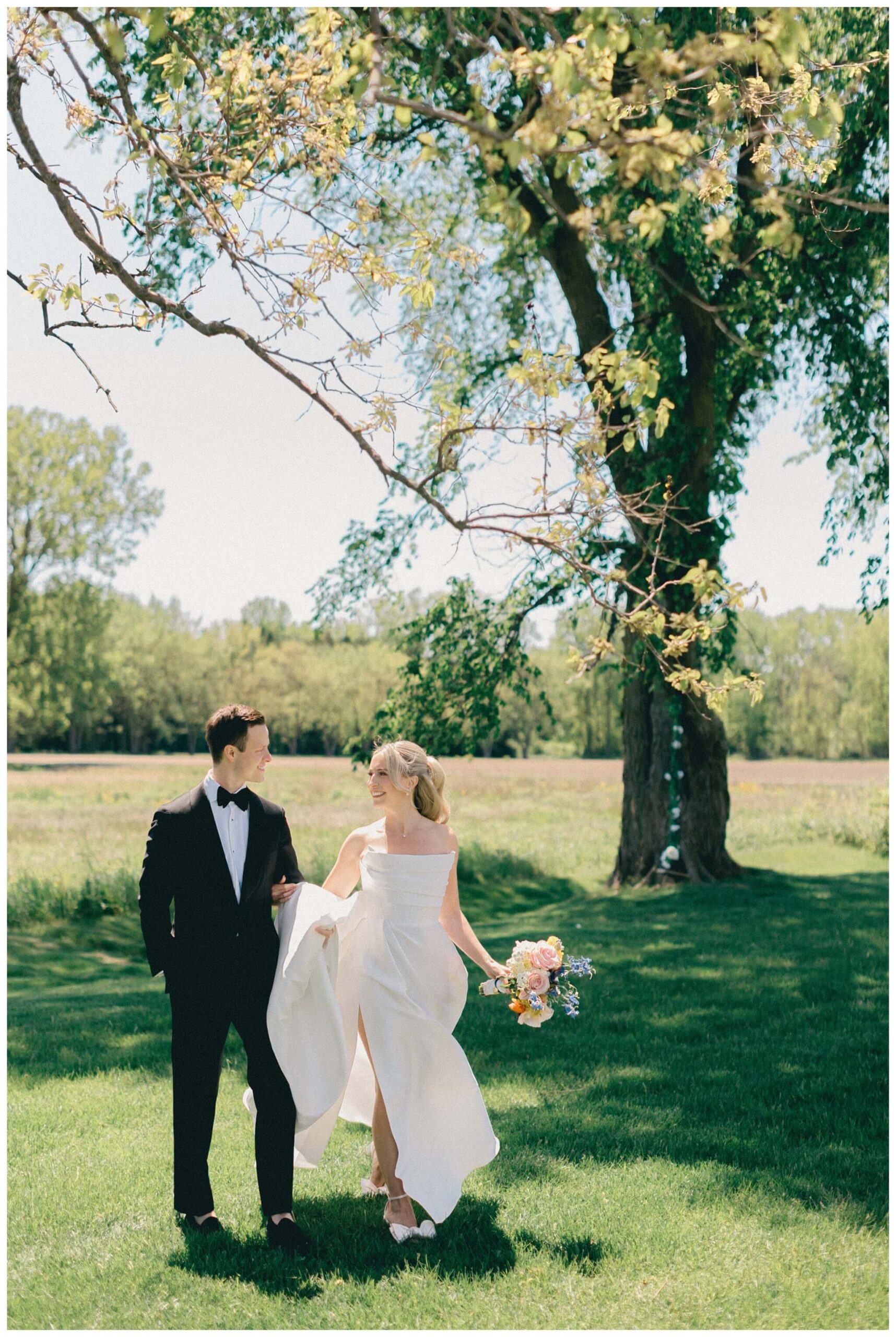 colorful white barn wedding at etre farms by lake michigan near saint joseph michigan by josh and andrea photography 