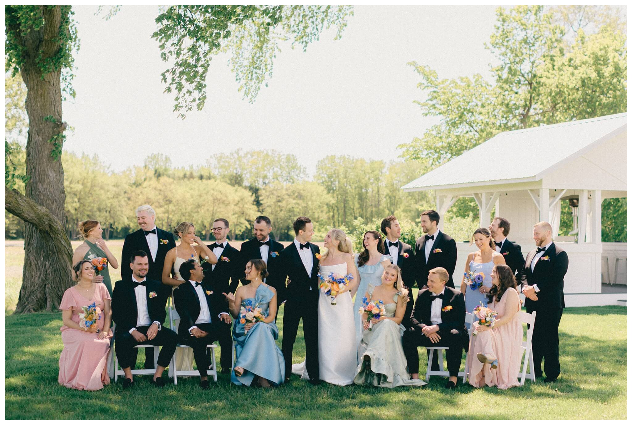 colorful white barn wedding at etre farms by lake michigan near saint joseph michigan by josh and andrea photography 