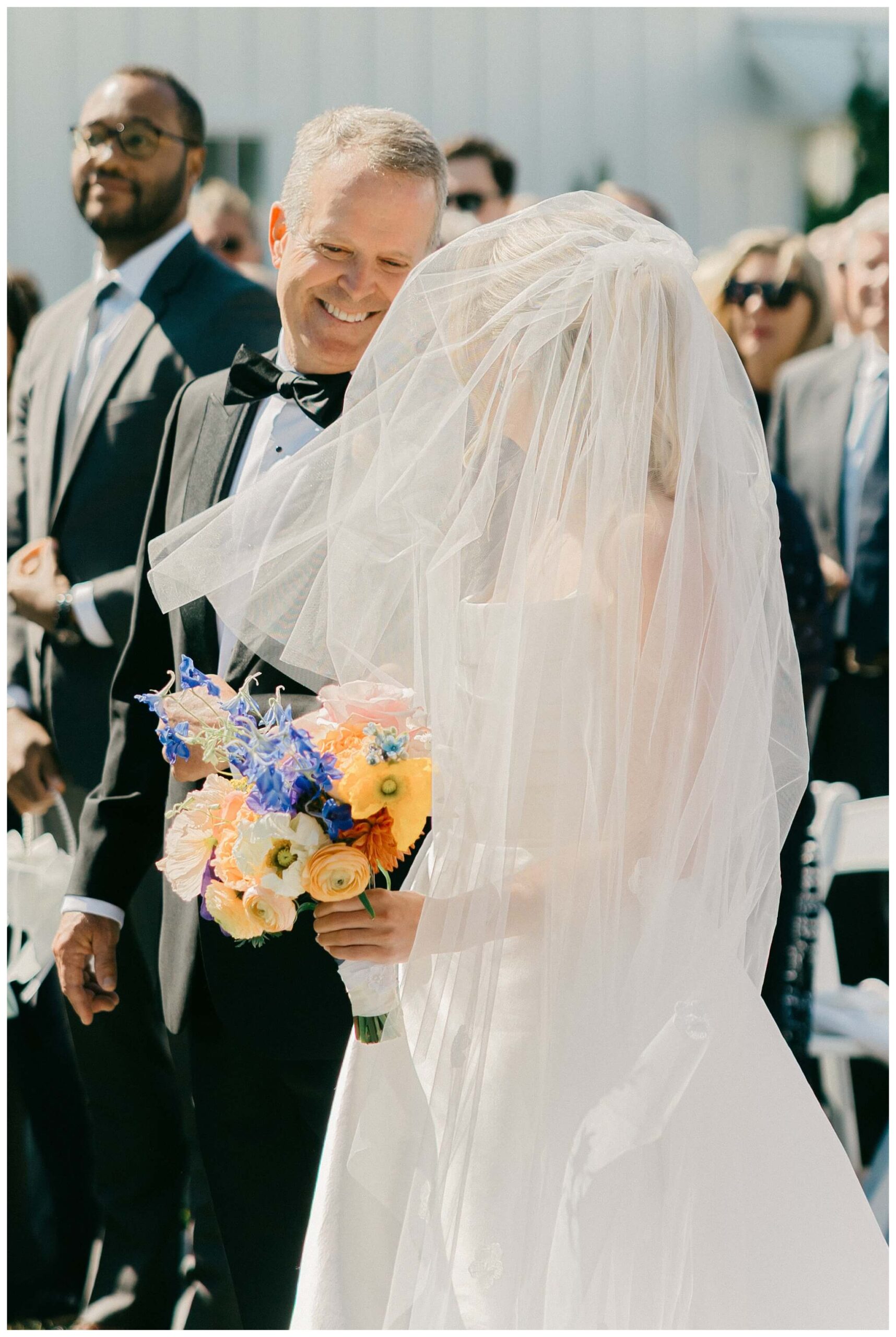 colorful white barn wedding at etre farms by lake michigan near saint joseph michigan by josh and andrea photography 