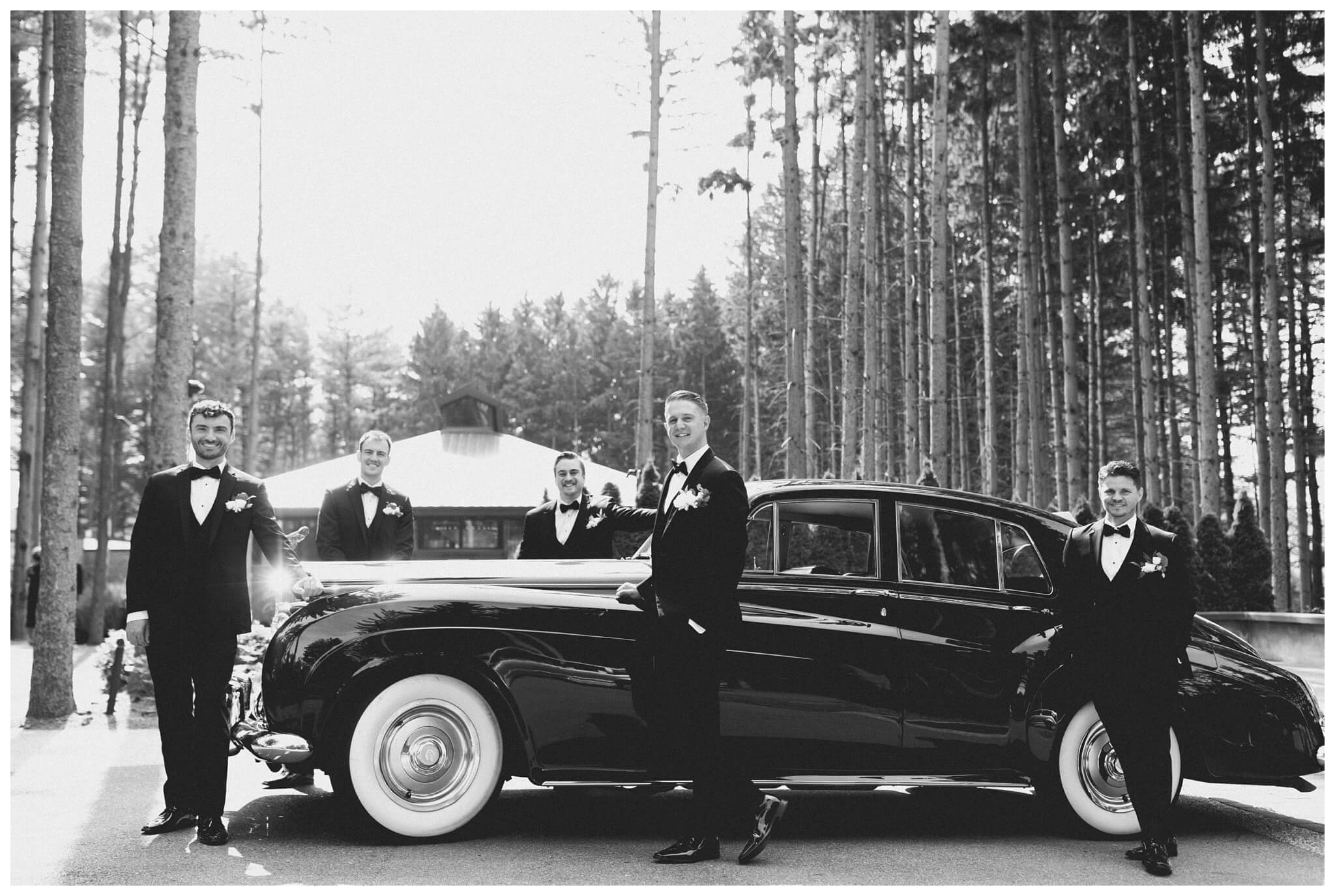 stunning black tie forest wedding with rolls royce vintage car at shepherds hollow near detroit michigan by josh and andrea photography