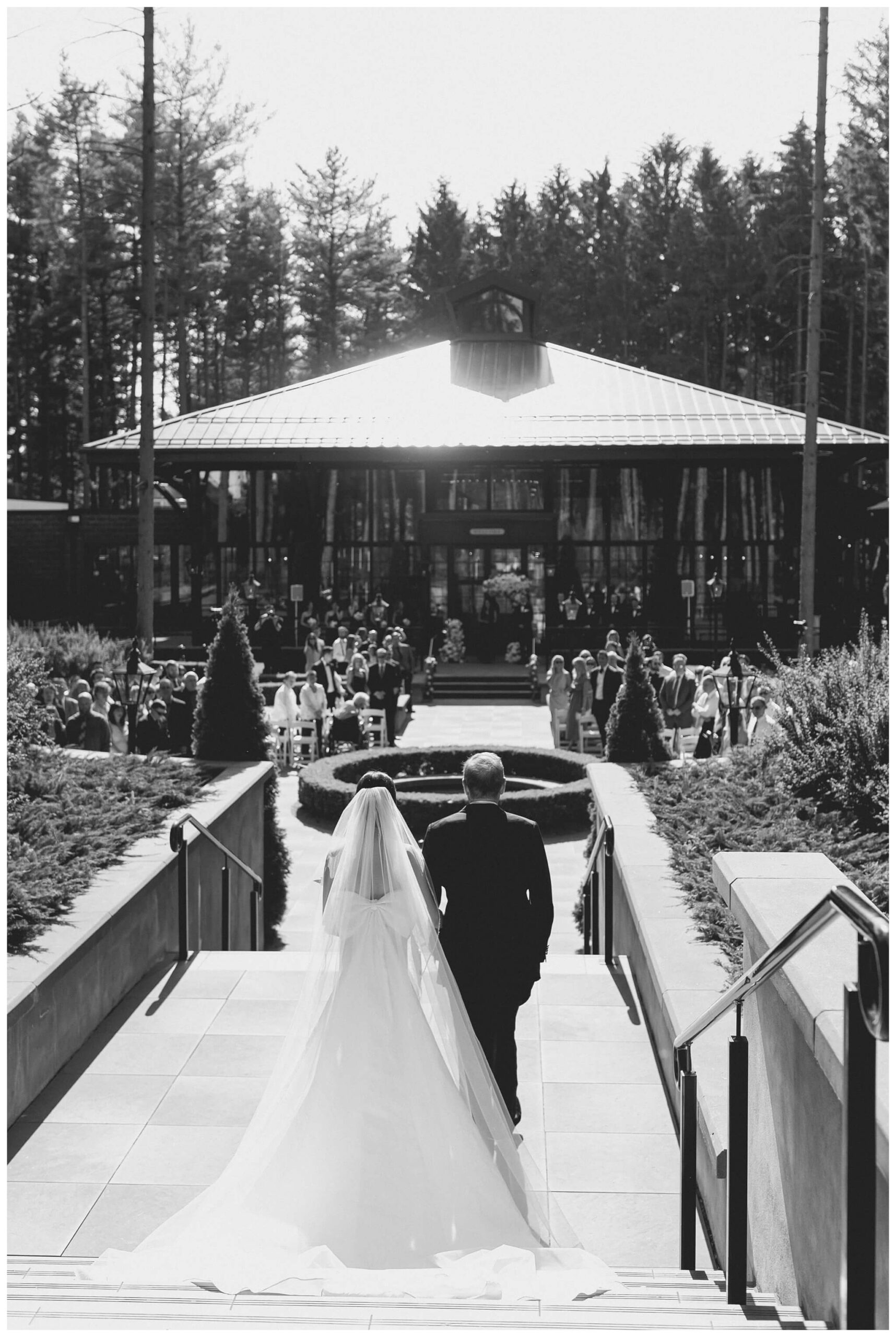 stunning black tie forest wedding with rolls royce vintage car at shepherds hollow near detroit michigan by josh and andrea photography