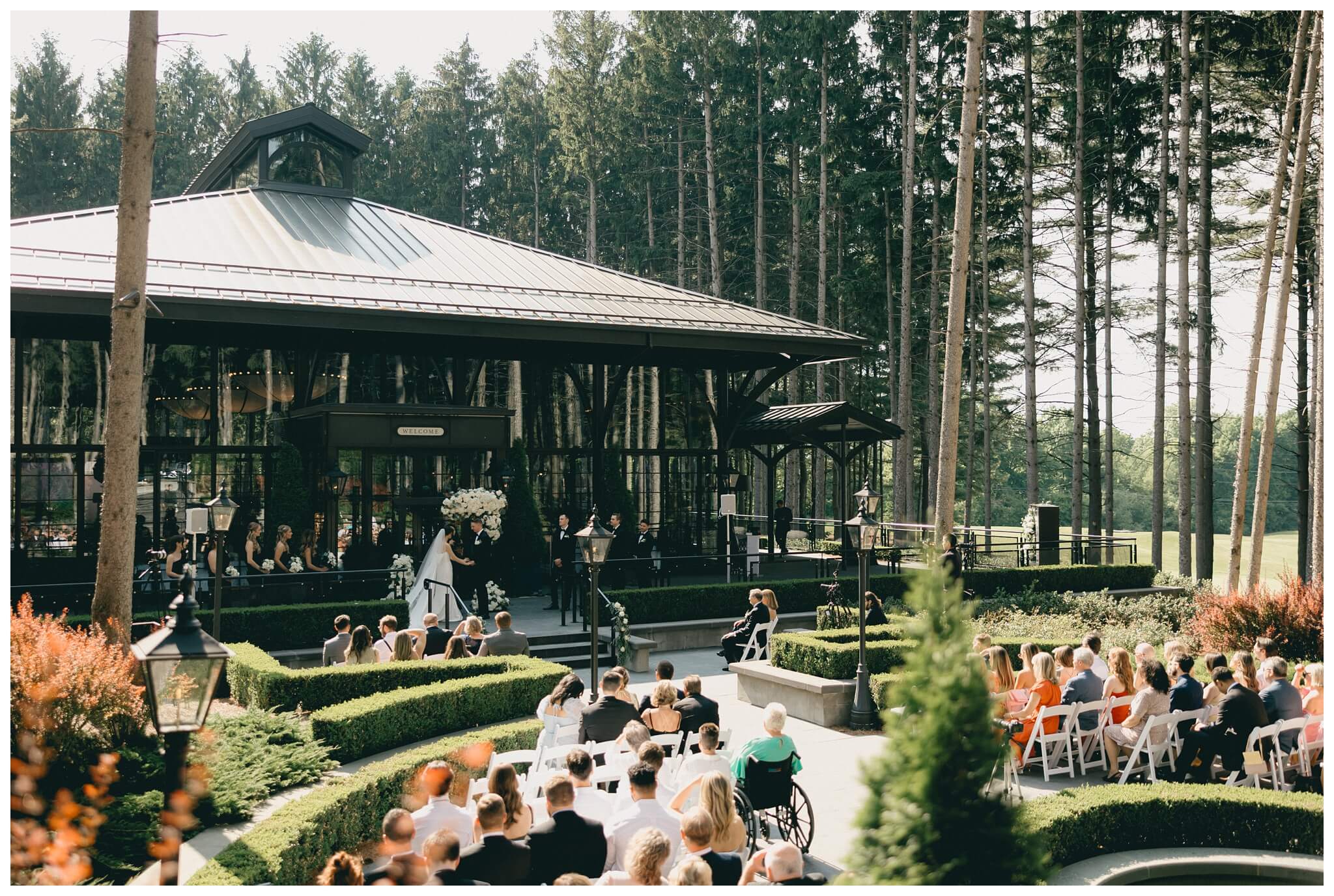 stunning black tie forest wedding with rolls royce vintage car at shepherds hollow near detroit michigan by josh and andrea photography
