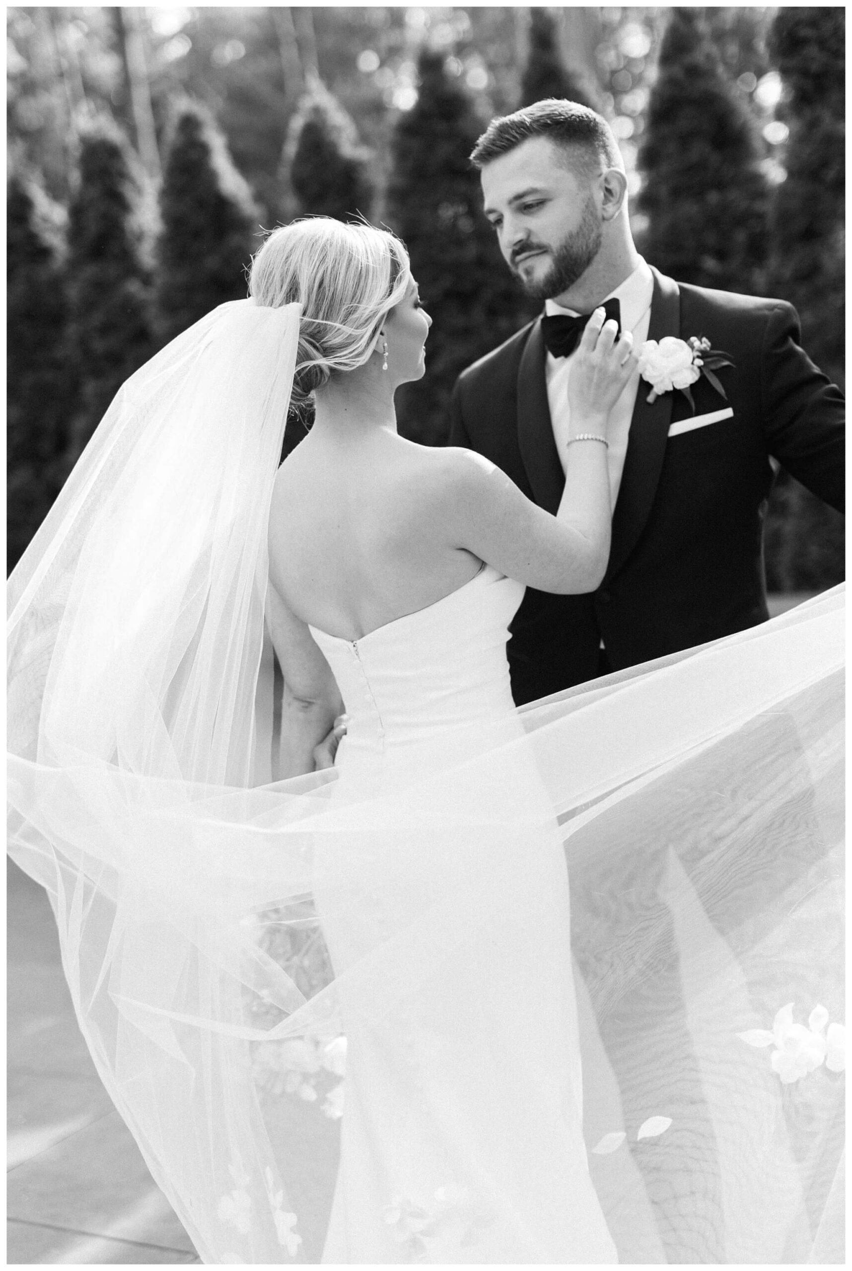 iconic black and white wedding in a forest at shepherds hollow gold club near detroit michigan by josh and andrea photography 