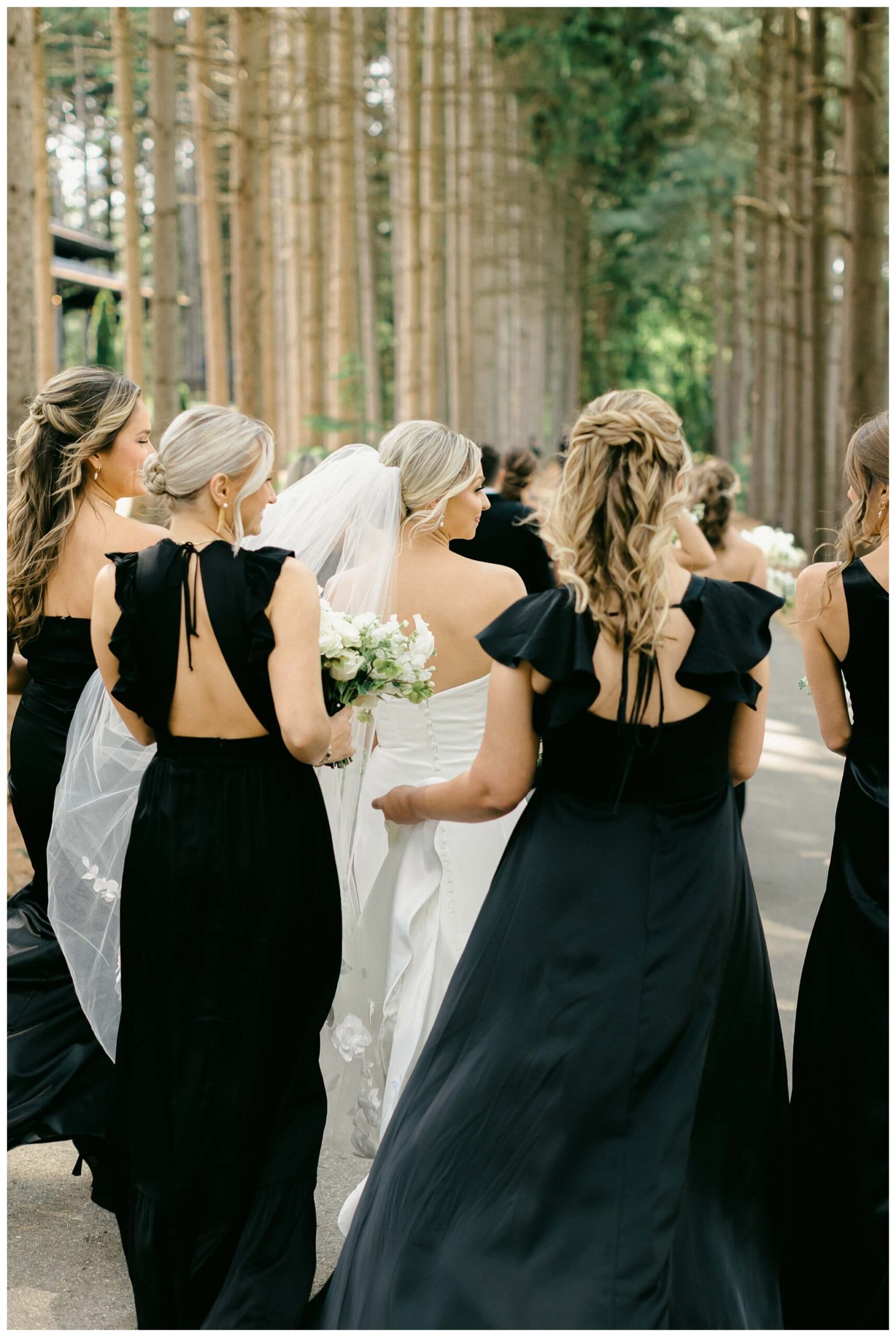 iconic black and white wedding in a forest at shepherds hollow gold club near detroit michigan by josh and andrea photography 
